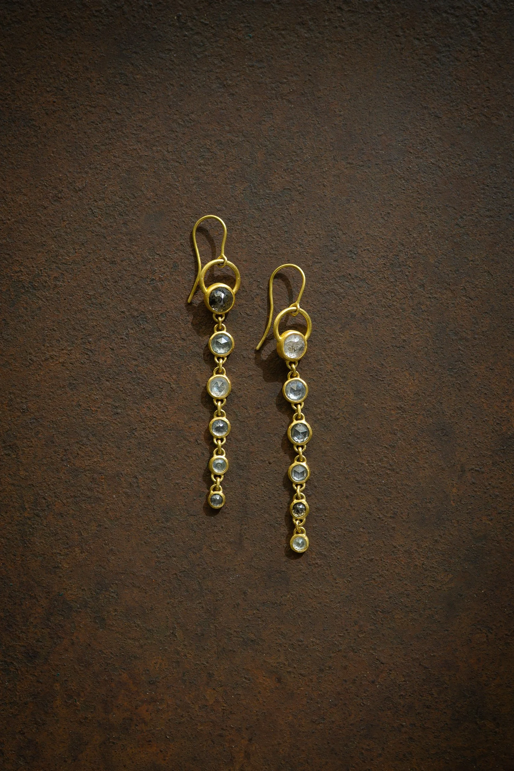 Dusk Earrings in 22 karat gold and rustic salt and pepper diamonds.