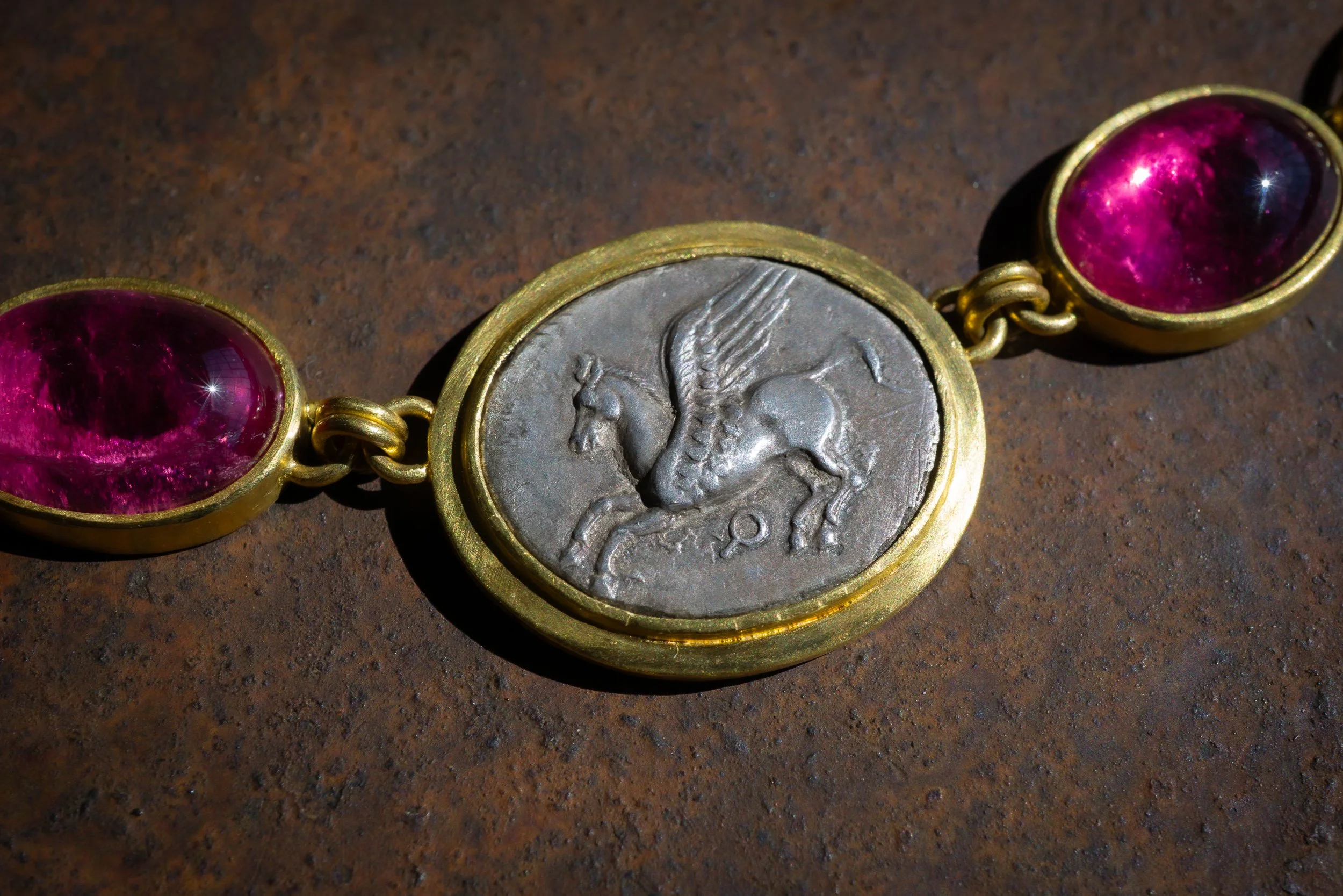 Pegasus Necklace detail of Pegasus coin.