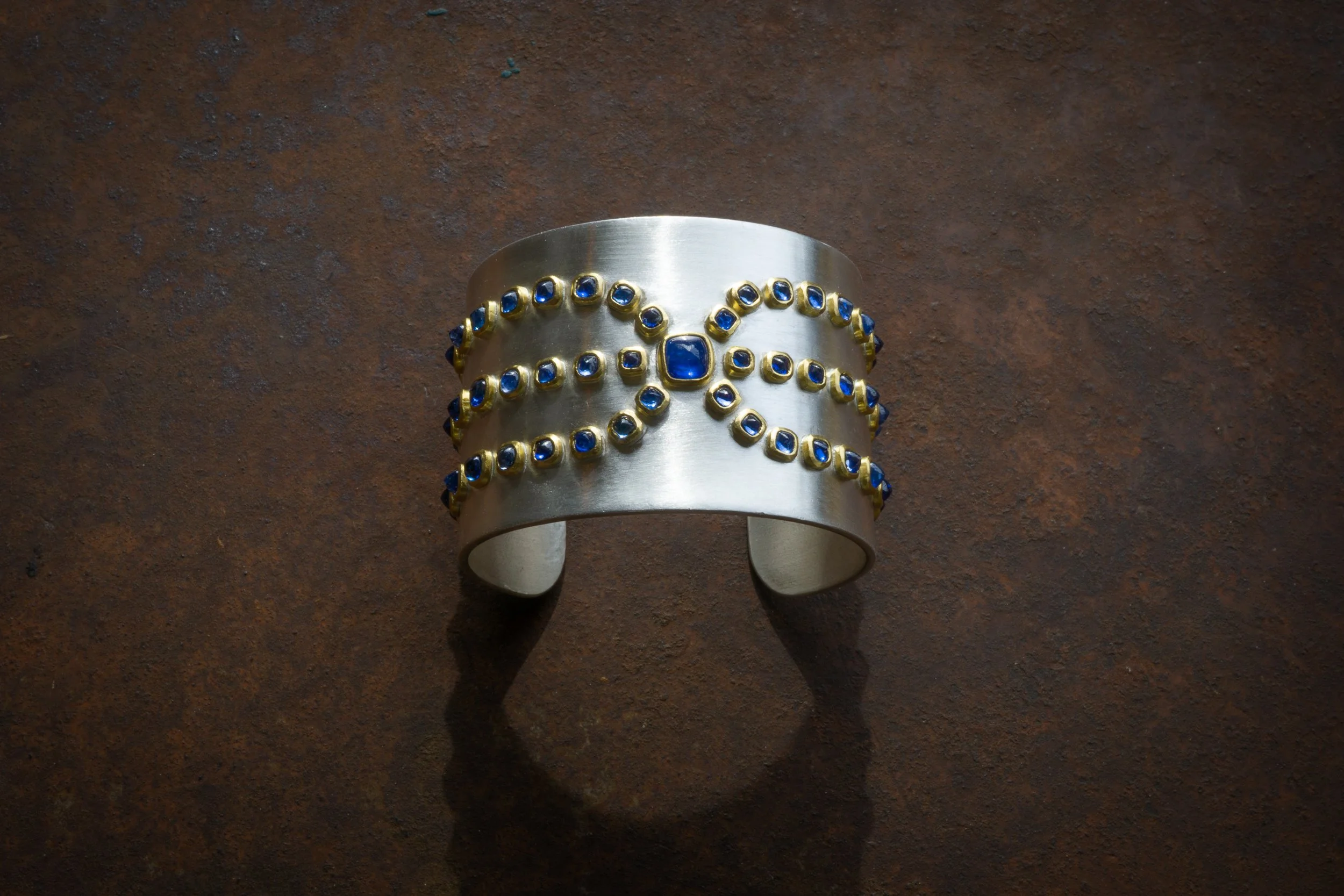 Alcyone Cuff in 22k gold, fine silver, and sapphire.