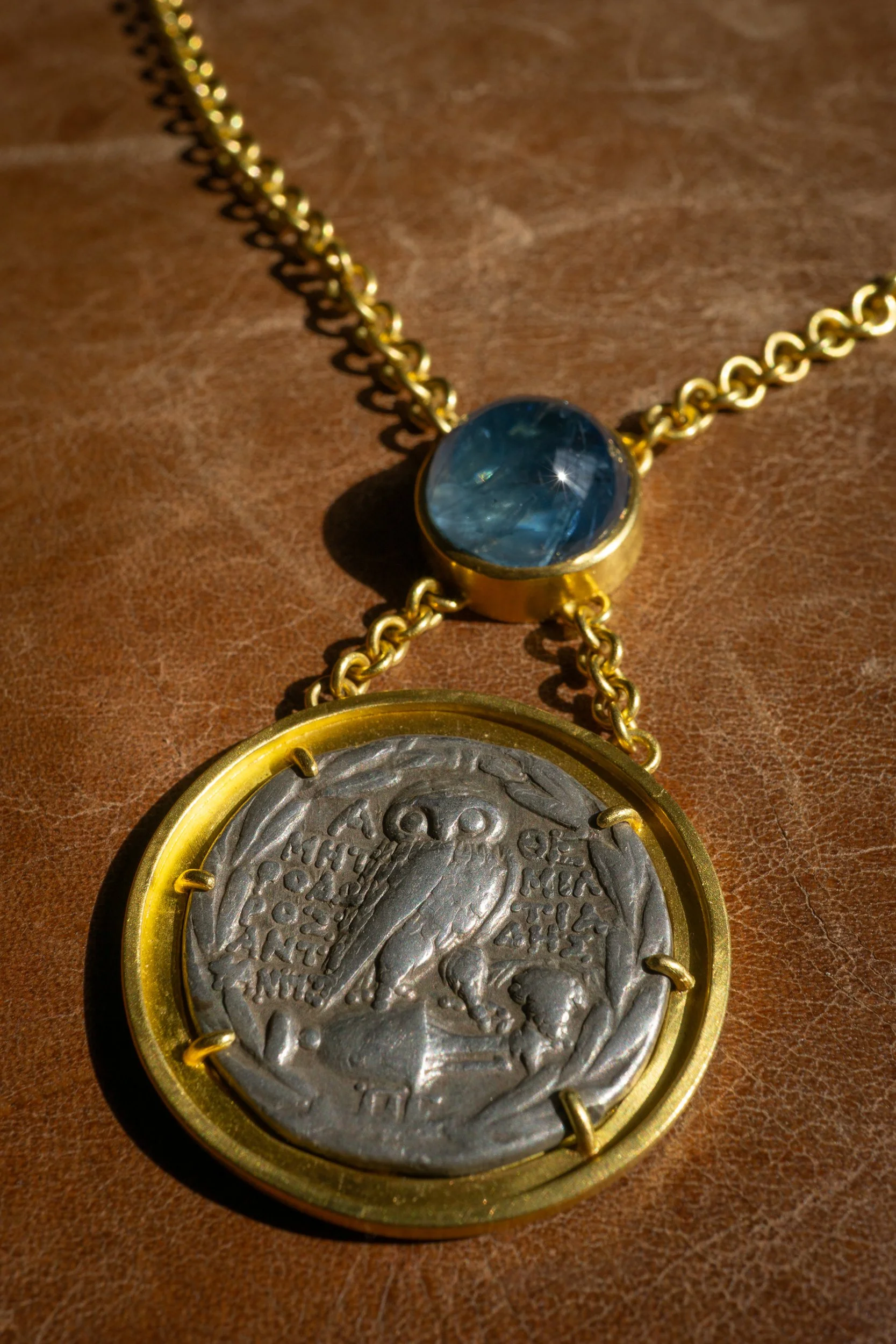 Aegean Necklace, detail view of owl coin.