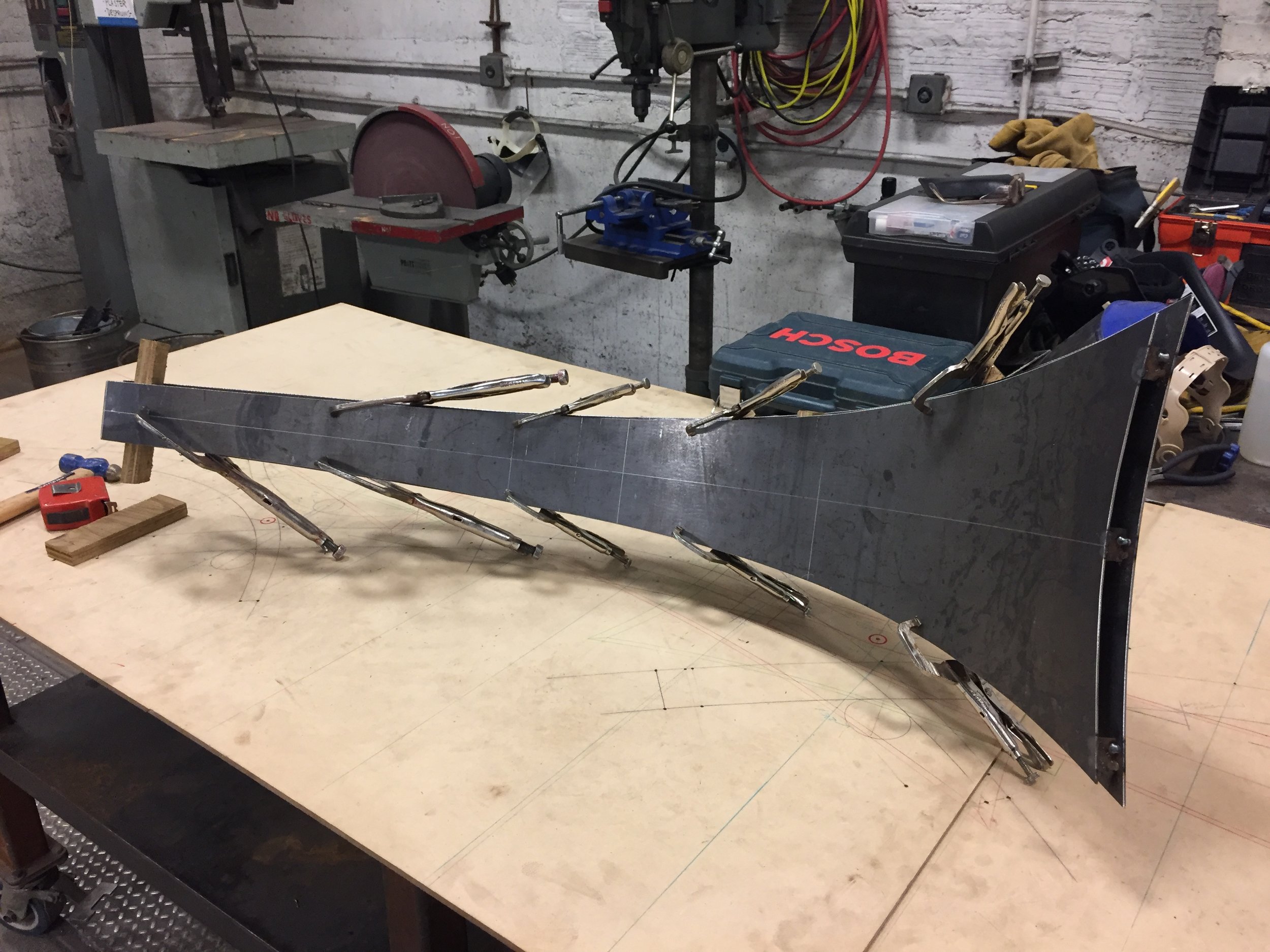 Tacking together the front and back panels of an awn element