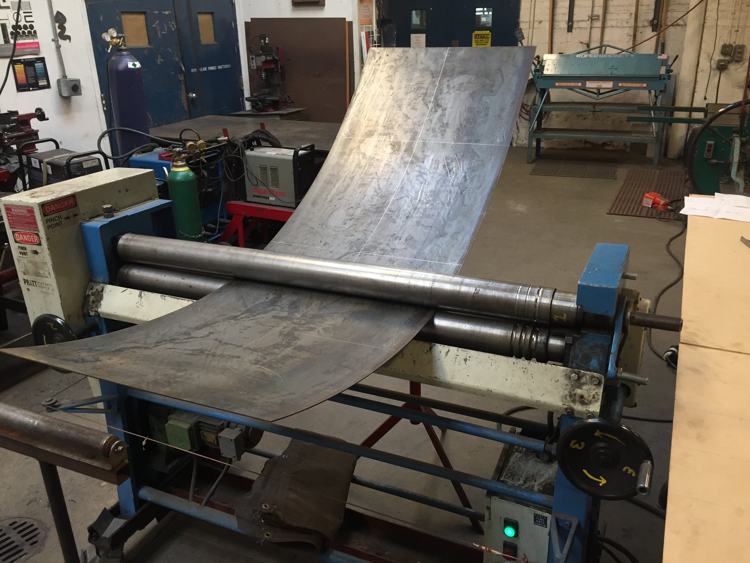 Rolling panels into eliptical forms