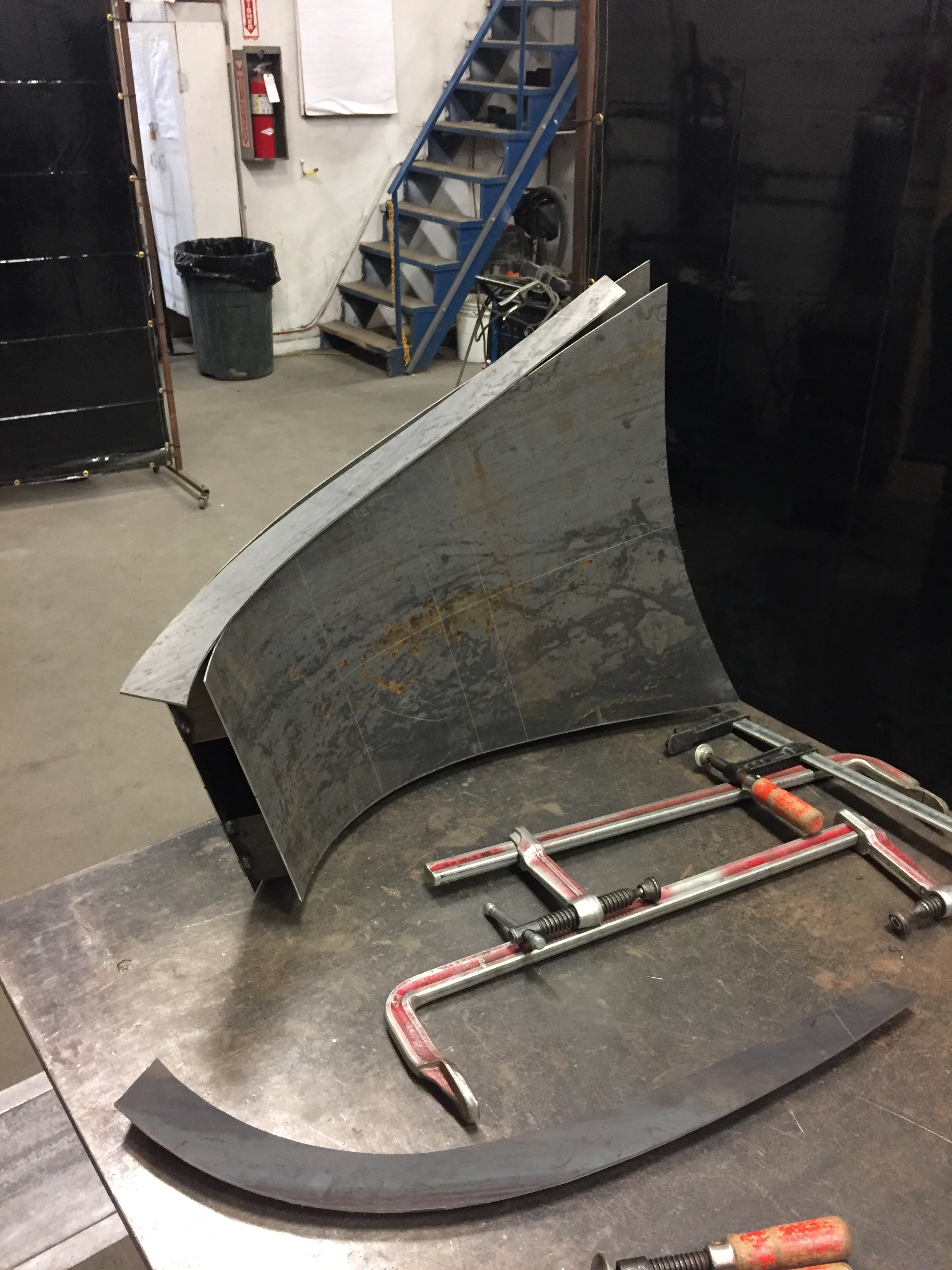 Shield element sides formed, scribed, and cut out
