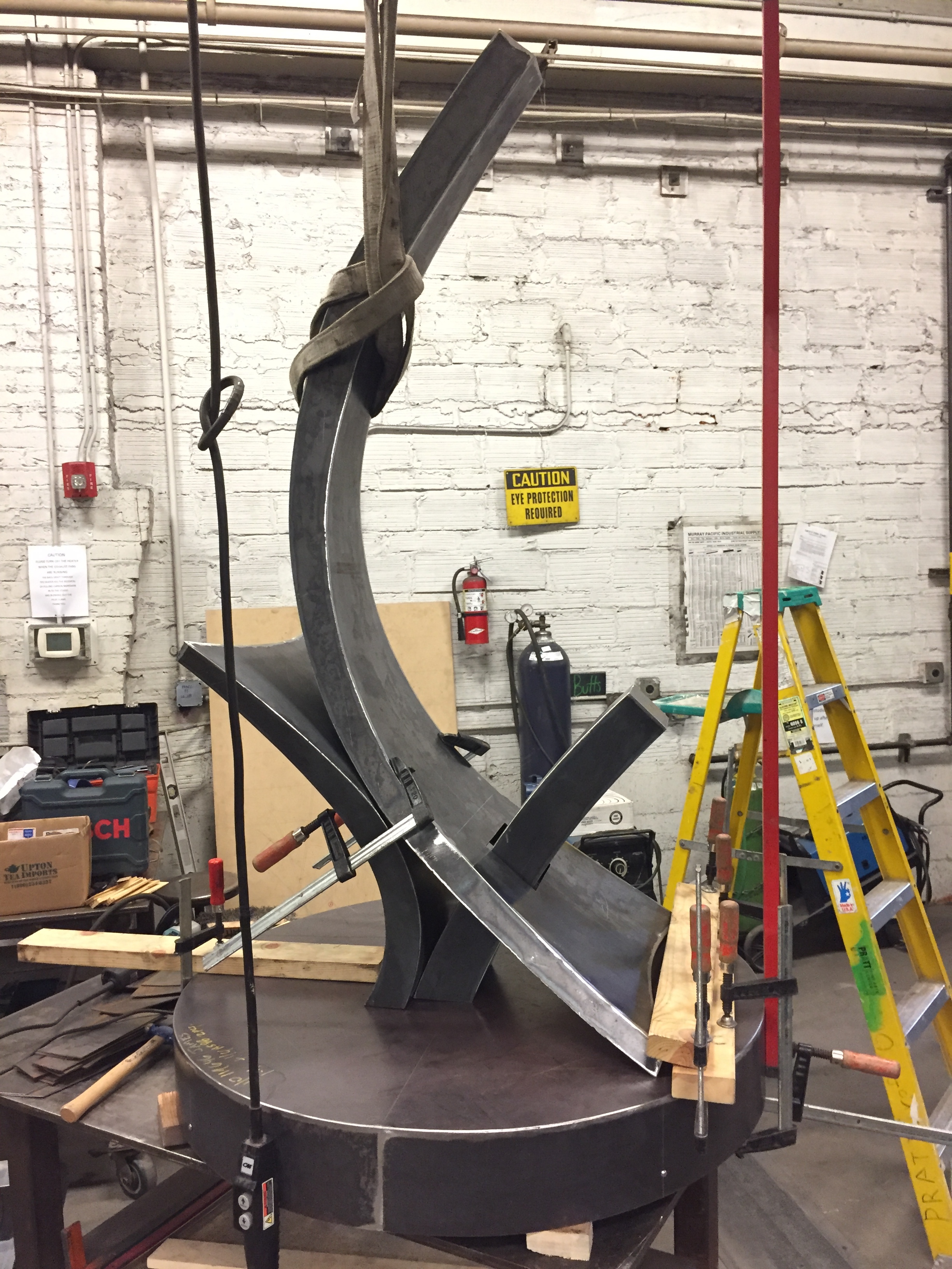 Dry fitting first tier components on sculpture base