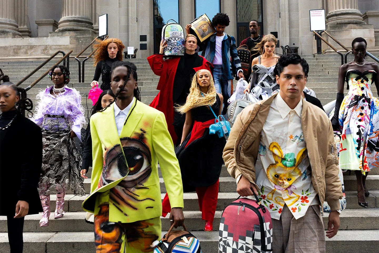 Sprayground x The Met licensed backpack collection presented on the steps of The Metropolitan Museum of Art