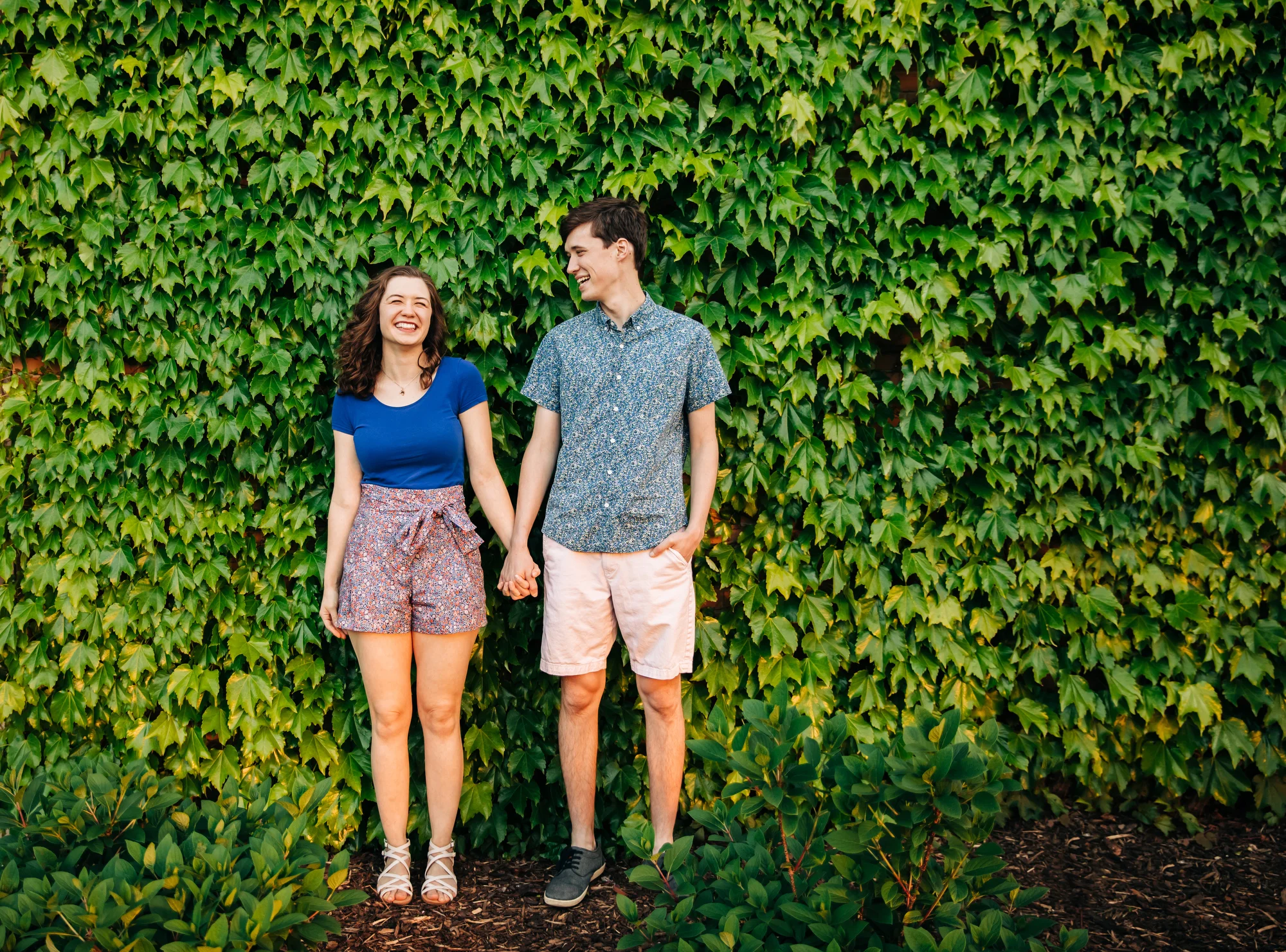  Michigan State University campus spring engagement session in East Lansing, Michigan of Isi and Thad by Pop Mod Photo photographers Ryan Garza & Courtney Simpson. 