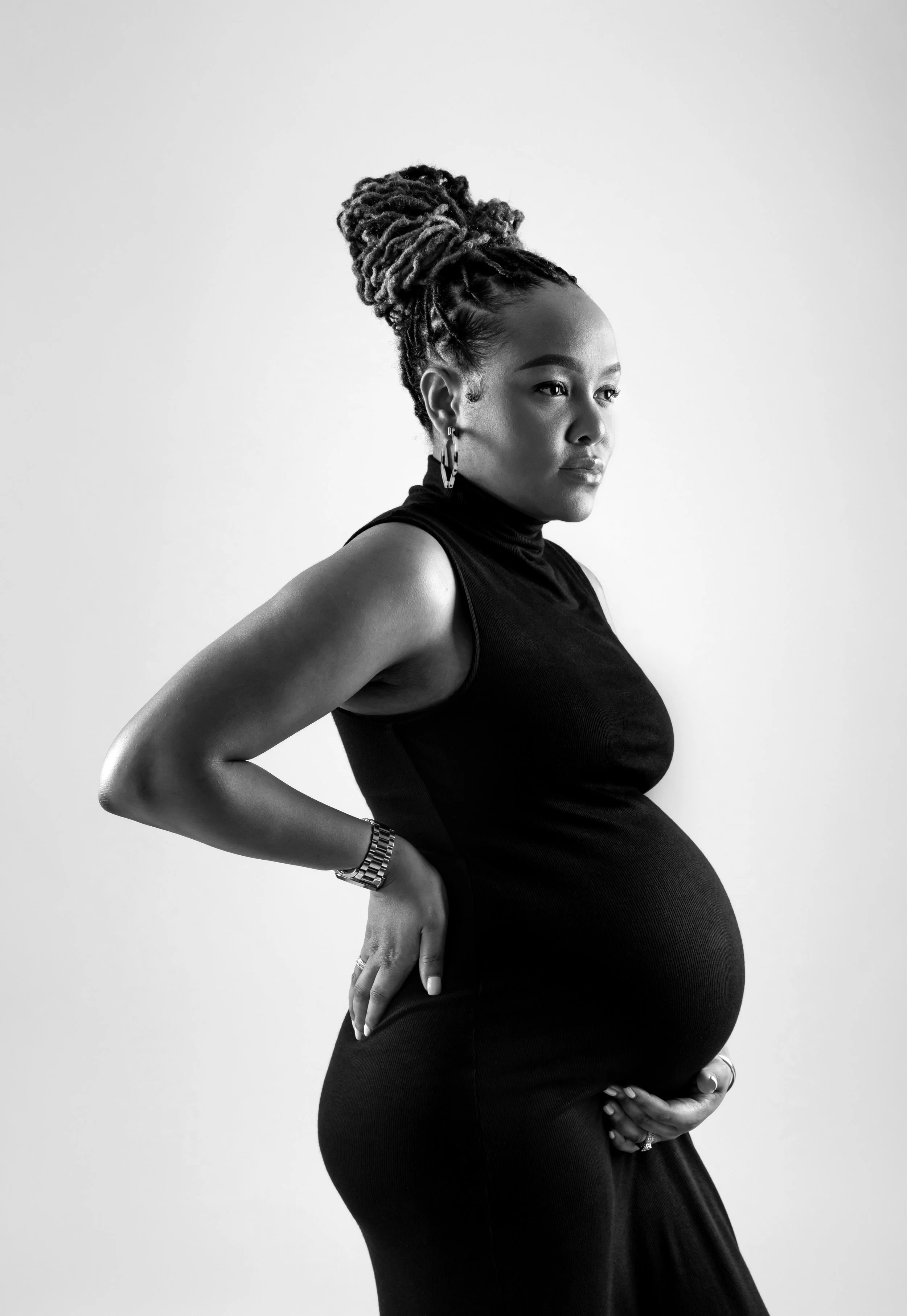  In-studio Maternity session by Pop Mod Photo photographers Ryan Garza and Courtney Simpson in Flint, Michigan. 