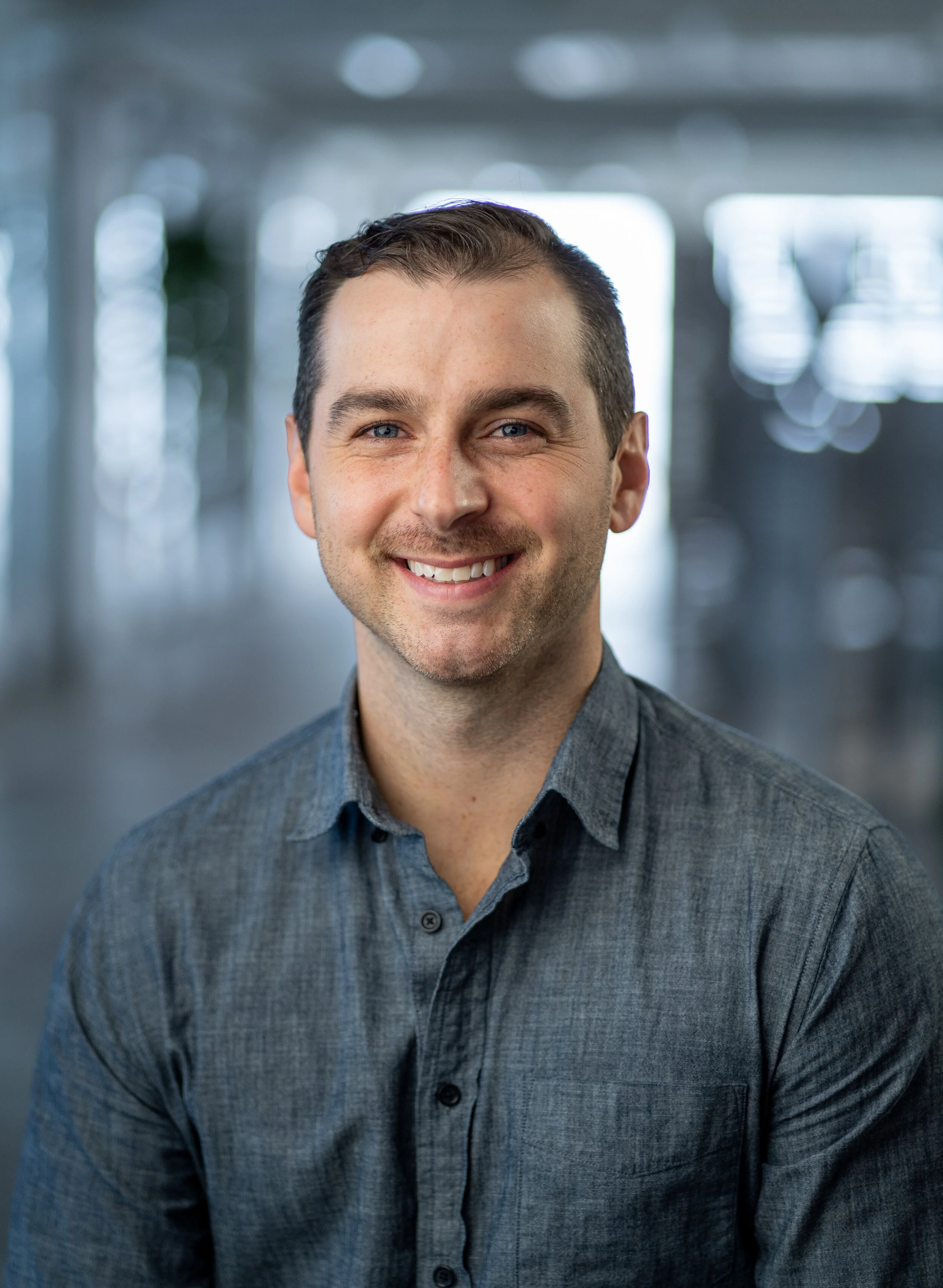  In studio headshot photo session in downtown Flint, Michigan by Pop Mod Photo photographers Ryan Garza and Courtney Simpson. 