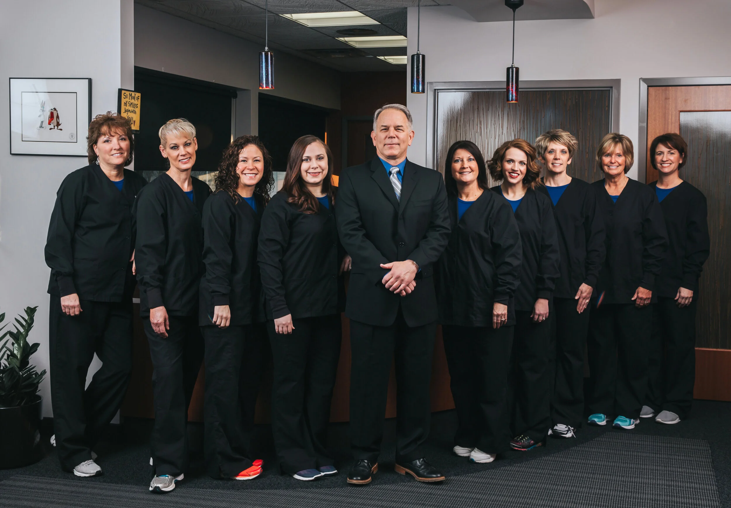  Dr. Martin Werschky family dentistry on location headshot photo session in downtown Flint, Michigan by Pop Mod Photo photographers Ryan Garza and Courtney Simpson. 