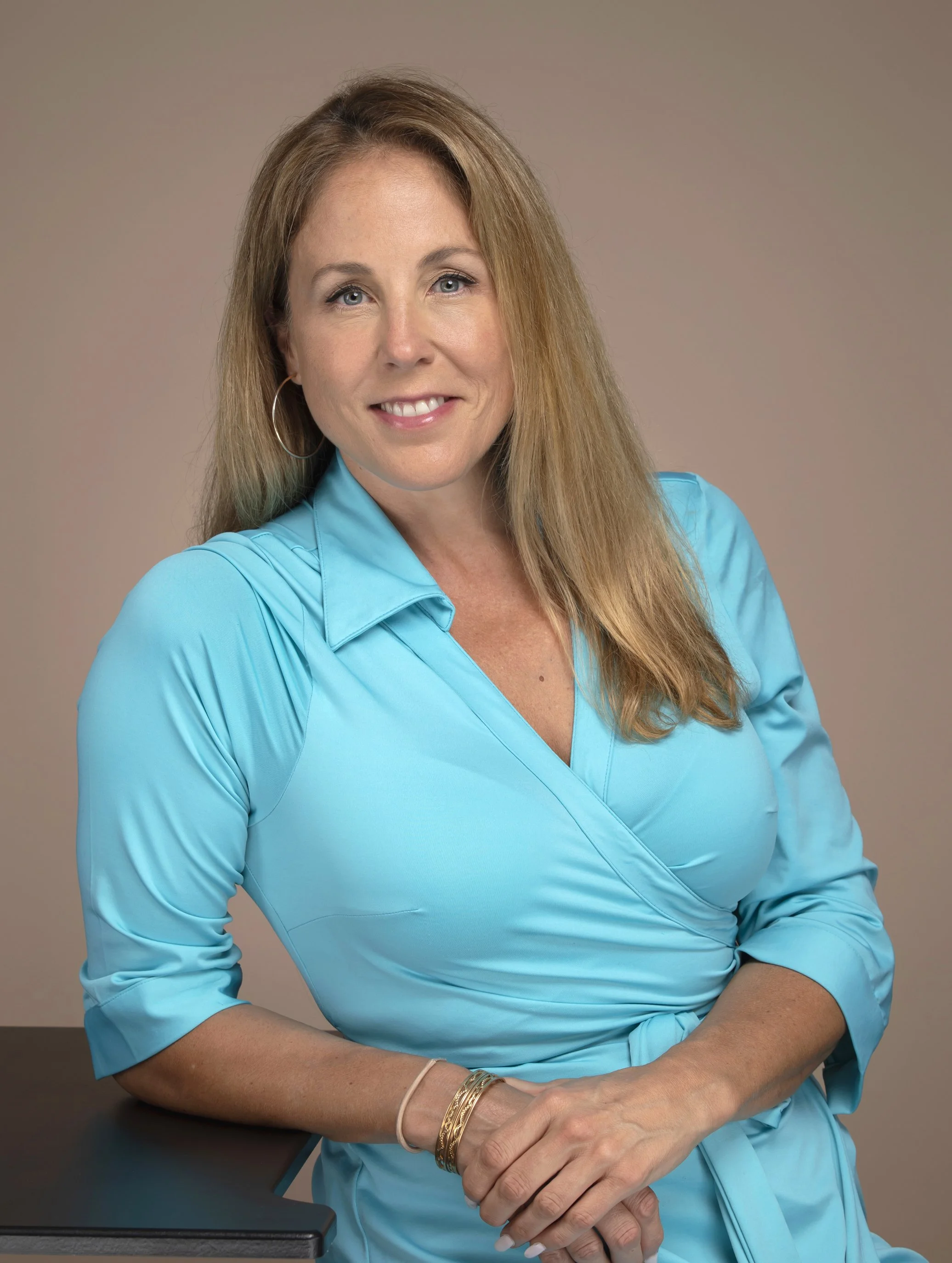  In-studio headshot photo session of estate planning attorney Heidi McAra by Pop Mod Photo photographers Ryan Garza and Courtney Simpson. 