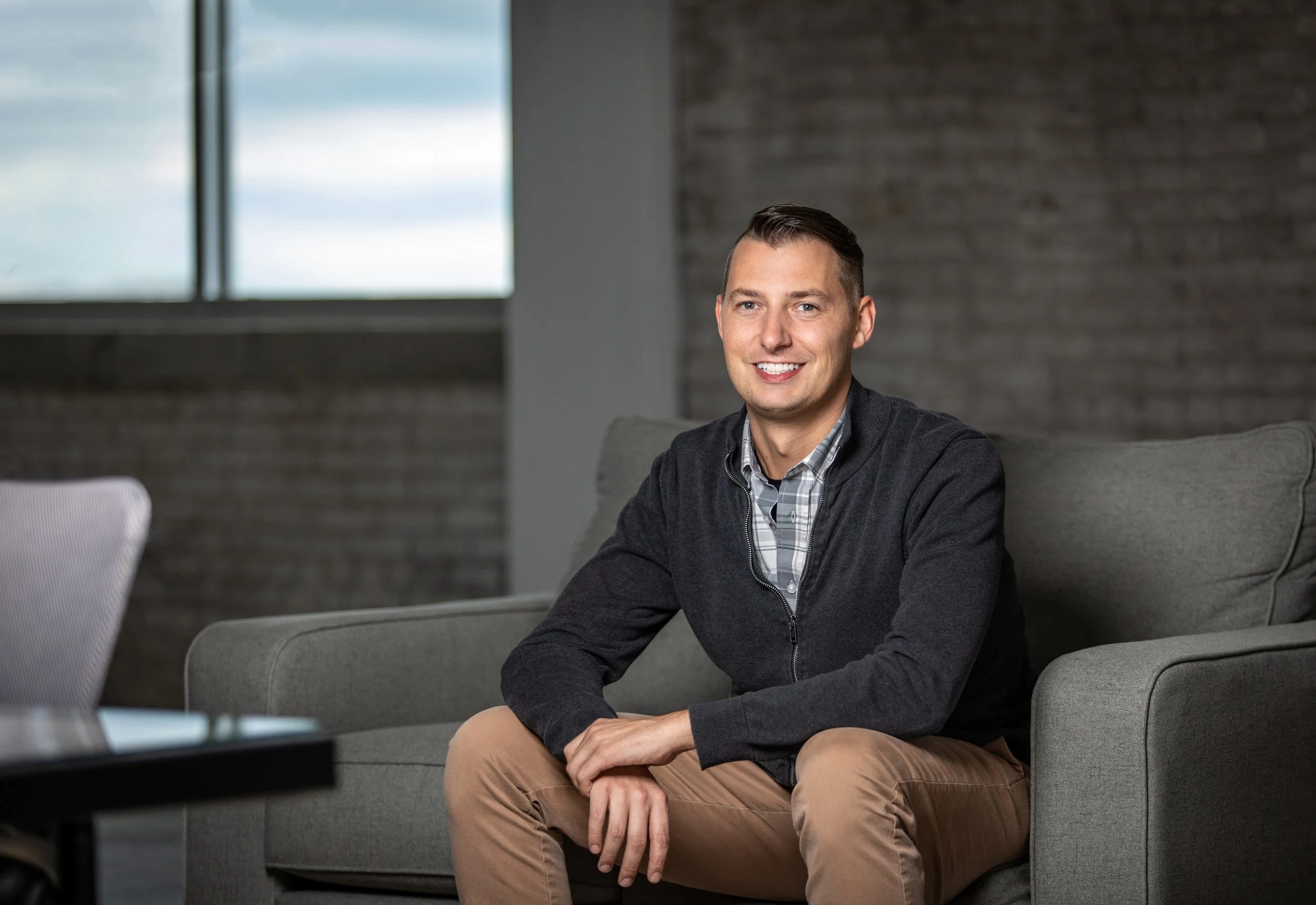  In Studio business headshot photo session of social worker in downtown Flint, Michigan by Pop Mod Photo photographers Courtney Simpson and Ryan Garza. 