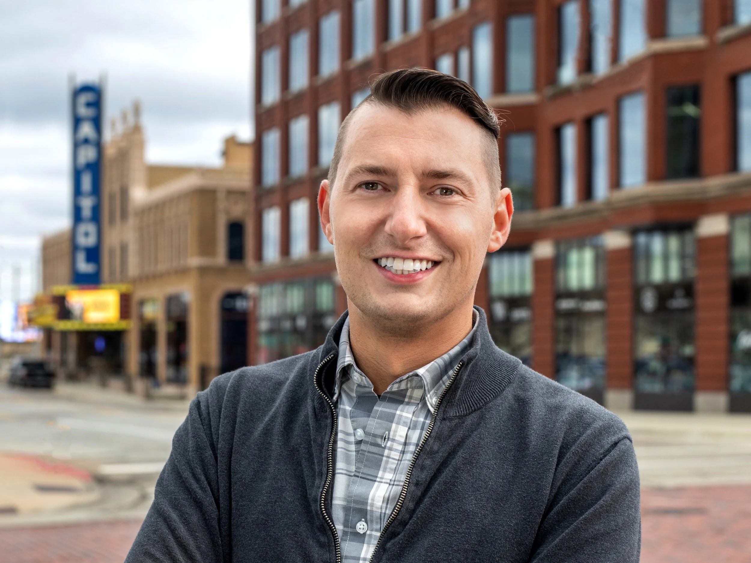  In Studio business headshot photo session of social worker in downtown Flint, Michigan by Pop Mod Photo photographers Courtney Simpson and Ryan Garza. 