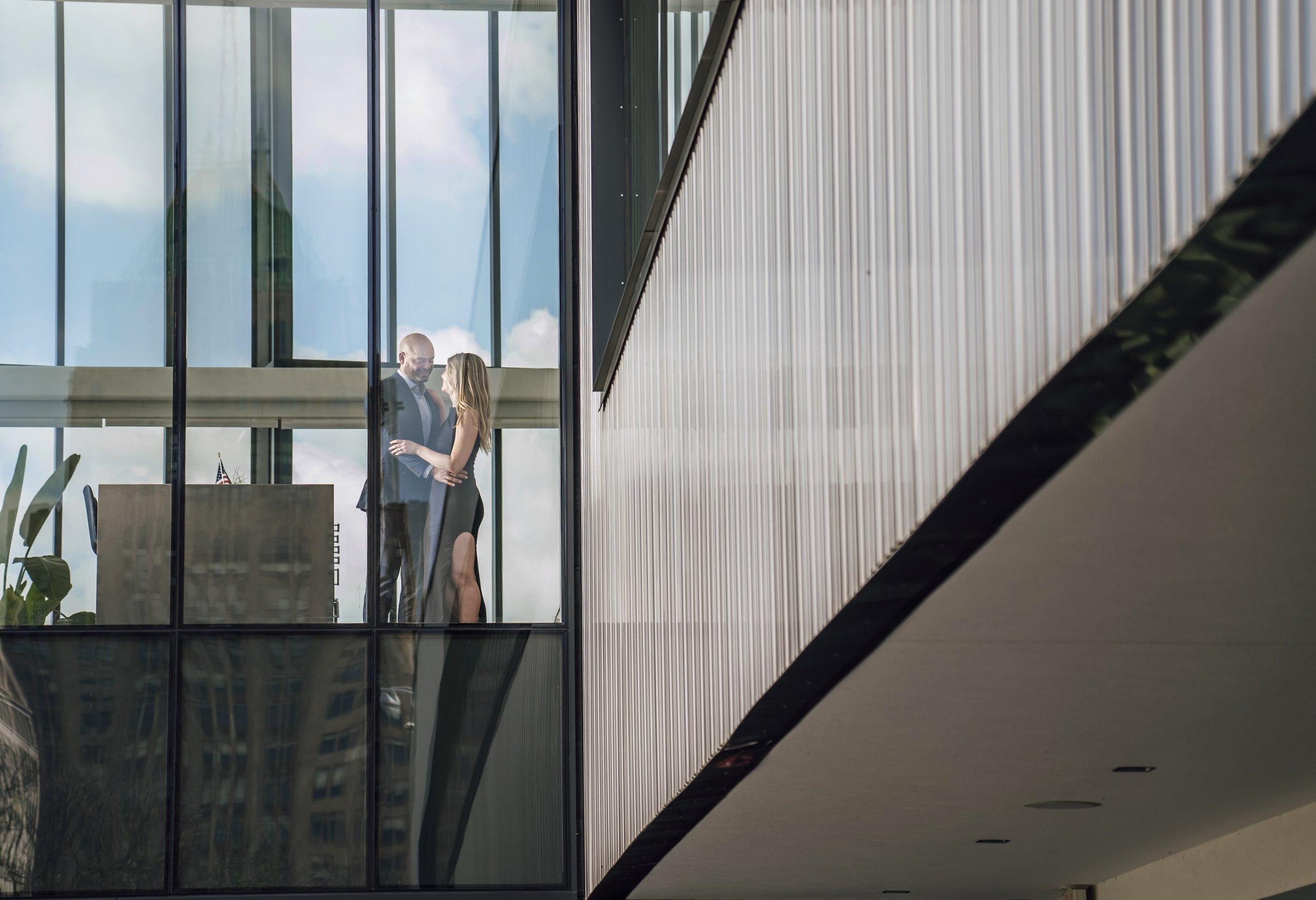  Adrienne and Rich started their engagement photo session with Pop Mod Photo wedding photographers Ryan Garza and Courtney Simpson walking around their Brush Park neighborhood in downtown Detroit before finishing with an in home engagement photo shoo