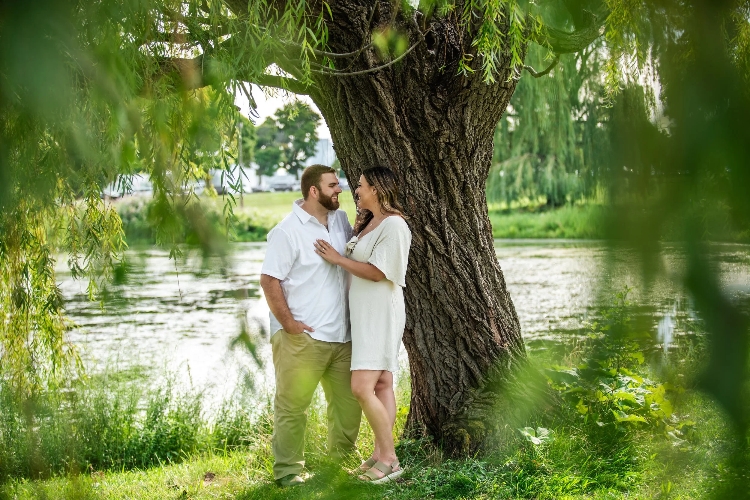  Nichole and Blake celebrated their outdoor summer engagement session at Belle Isle in Detroit, Michigan and were photographed by Pop Mod Photo wedding photographers Courtney Simpson and Ryan Garza. 