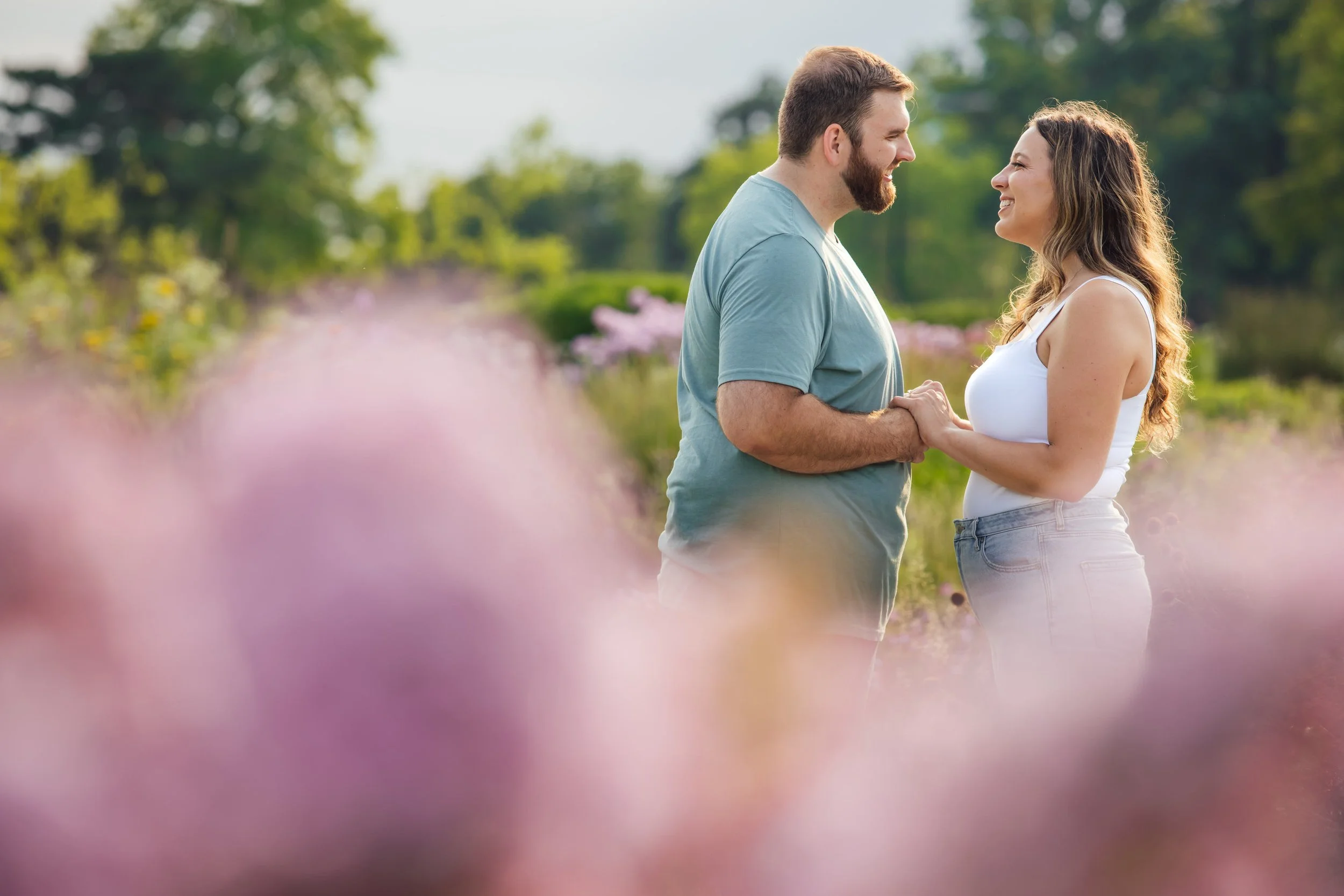  Nichole and Blake celebrated their outdoor summer engagement session at Belle Isle in Detroit, Michigan and were photographed by Pop Mod Photo wedding photographers Courtney Simpson and Ryan Garza. 