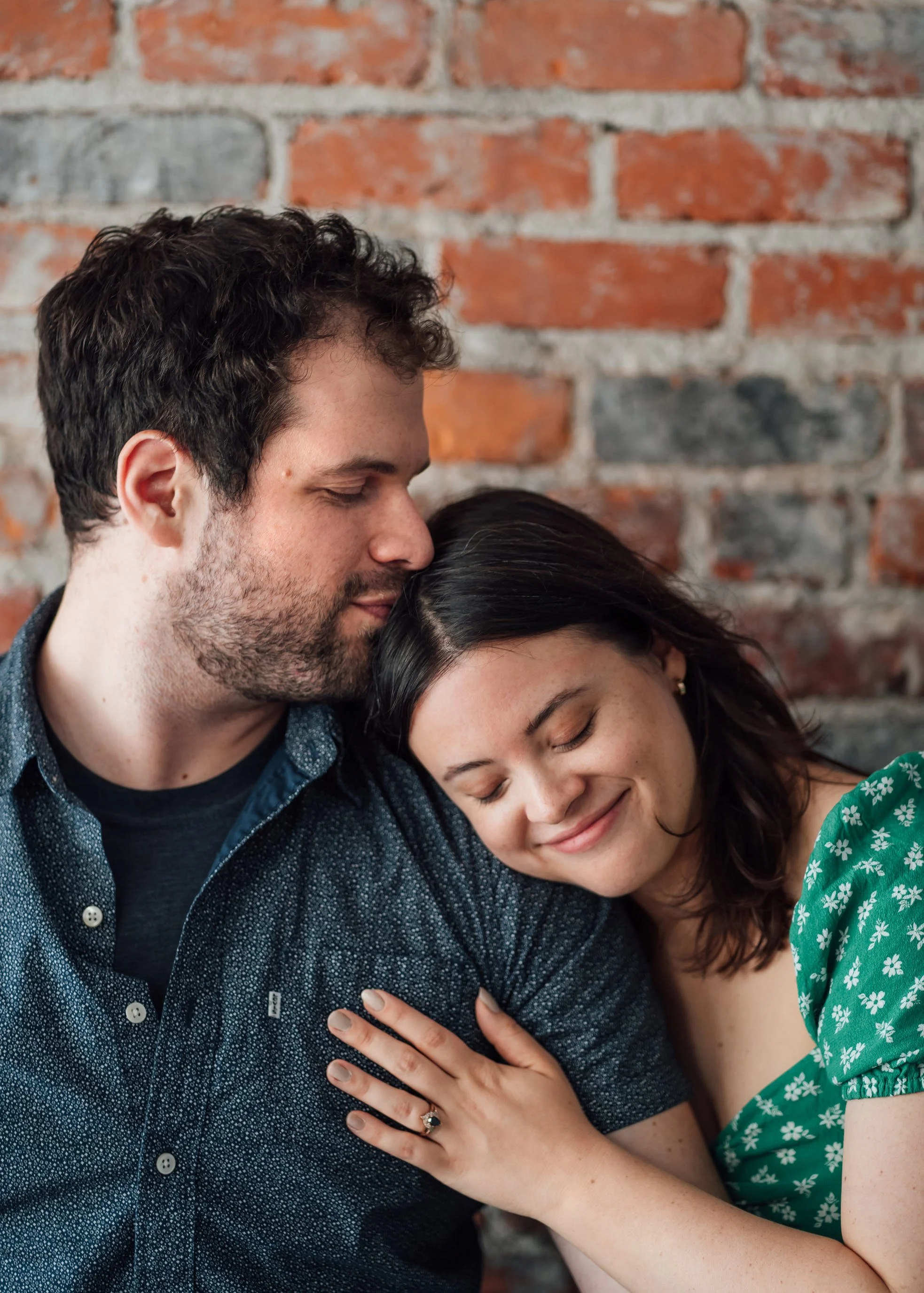 In studio Michigan engagement session of Kaitlin and Jordan at by Pop Mod Photo wedding photographers Ryan Garza and Courtney Simpson at their studio in downtown Flint, Michigan. 
