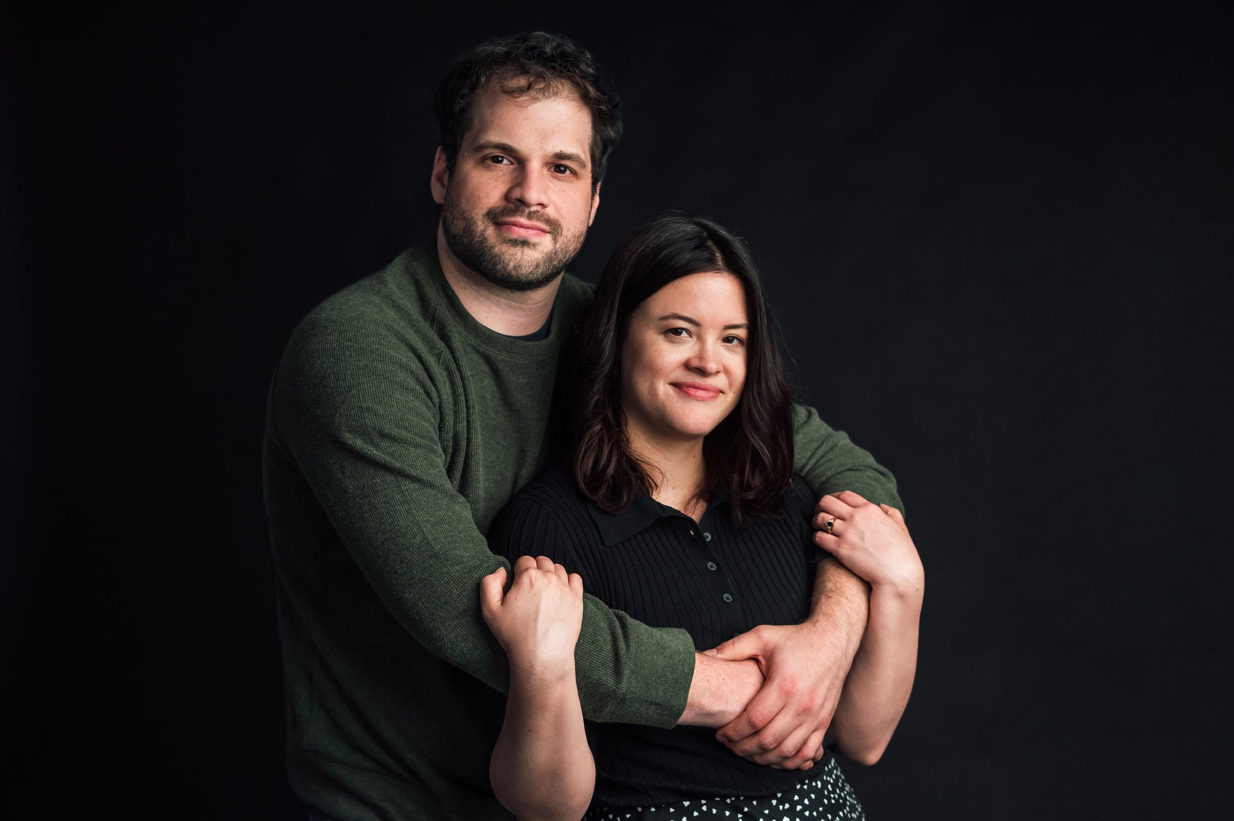  In studio Michigan engagement session of Kaitlin and Jordan at by Pop Mod Photo wedding photographers Ryan Garza and Courtney Simpson at their studio in downtown Flint, Michigan. 