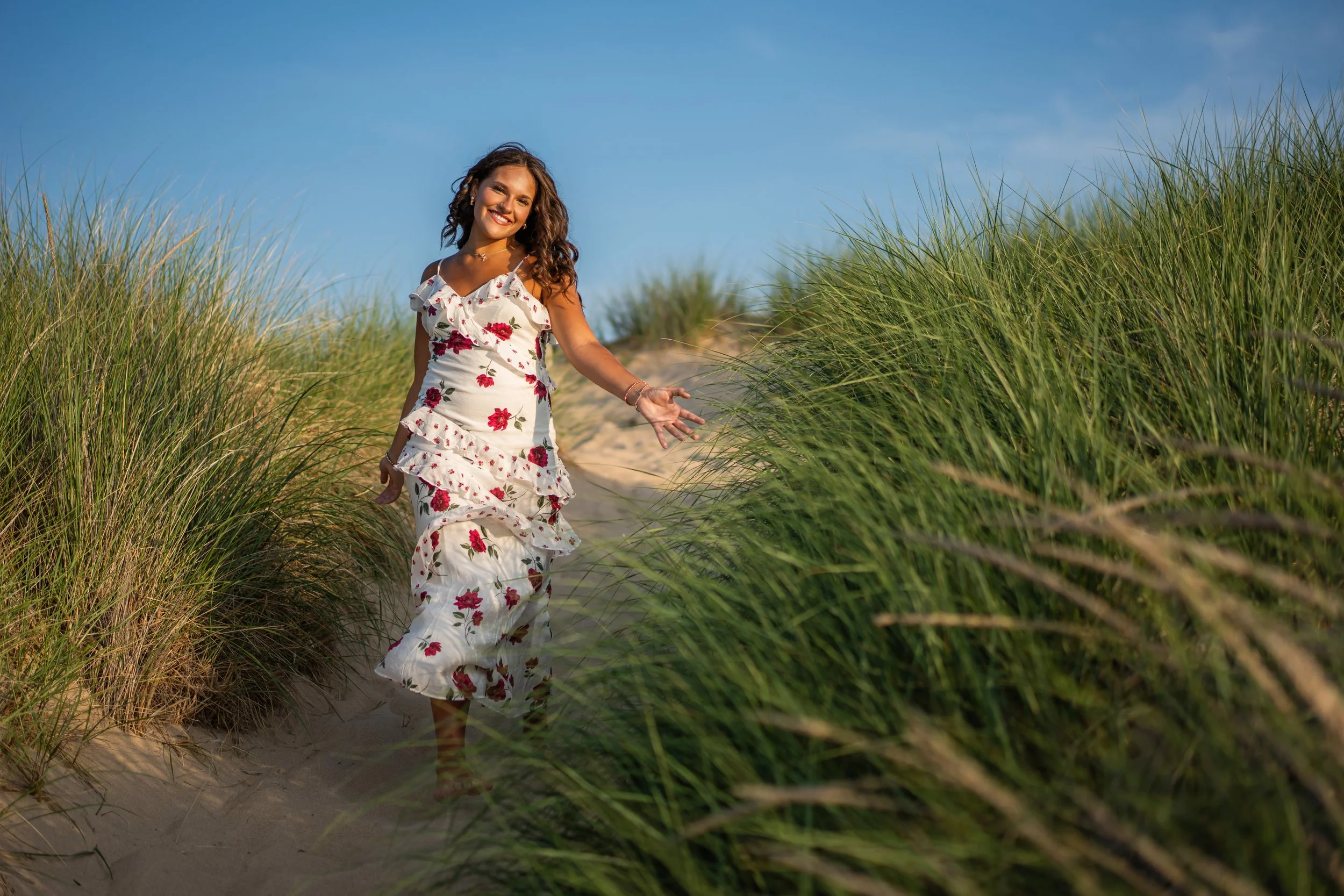  Davison High School senior Adelynn had her summer sunset beach portrait session with Pop Mod Photo senior photographers Ryan Garza and Courtney Simpson in Caseville, Michigan. 