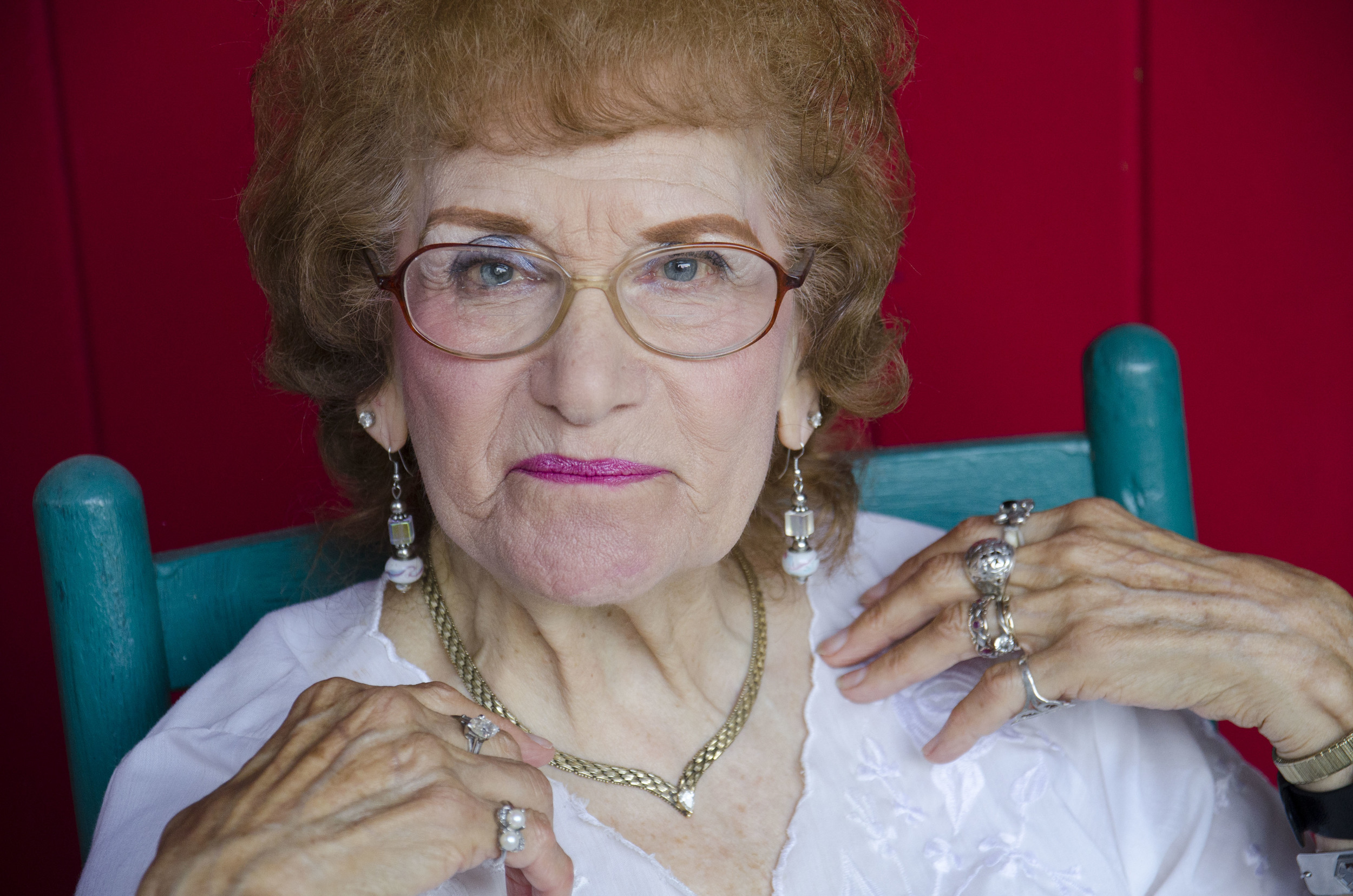  A veteran of the Emanuel Synagogue's Sisterhood, Gloria Bein is a master organizer and amazing contributor to the inner-workings of the West Hartford, CT Jewish community. Here, she sits on the porch of her bright red house studying her Haftorah por