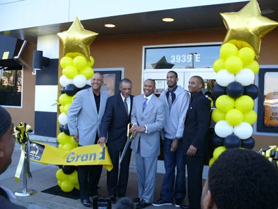 Politicians, entrepreneurs, and former Laker Trevor Ariza celebrate the opening of the Crenshaw District Buffalo Wild Wings.