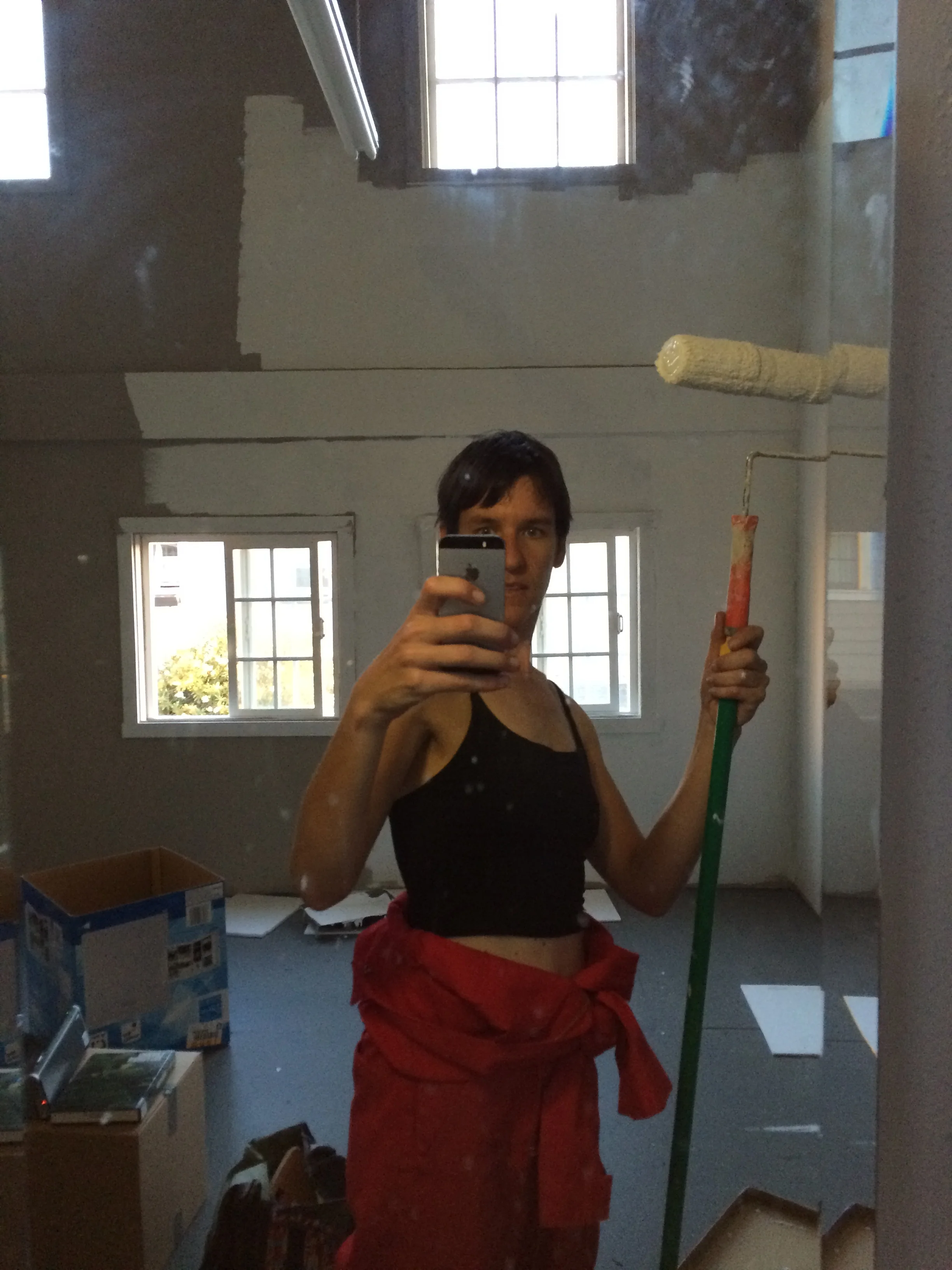 Who decided taupe was a good color for the studio don't ask me! One more gallon and we'll be done.