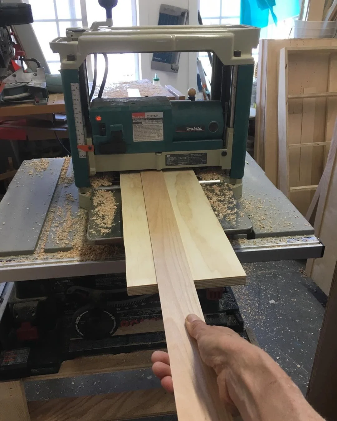 Did something new with my planer yesterday. Big plywood is a dumbie board and the birch slips right over the top to safely plane under 1/8 of an inch. Love my little Makita!
