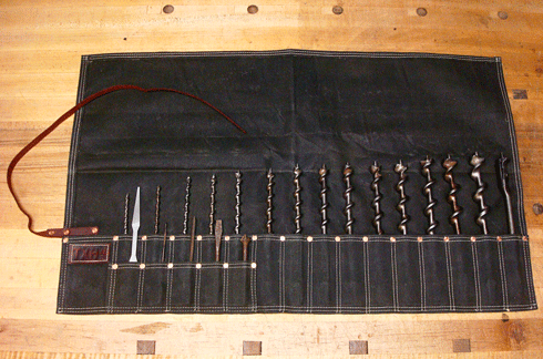 Total capacity of 20 bits . 15 full size pockets hold a complete set of Jennings or Irwin pattern Auger bits, plus a few extra. The 5 smaller pockets are perfect for those oft used accessories such as countersinks and gimlet bits.