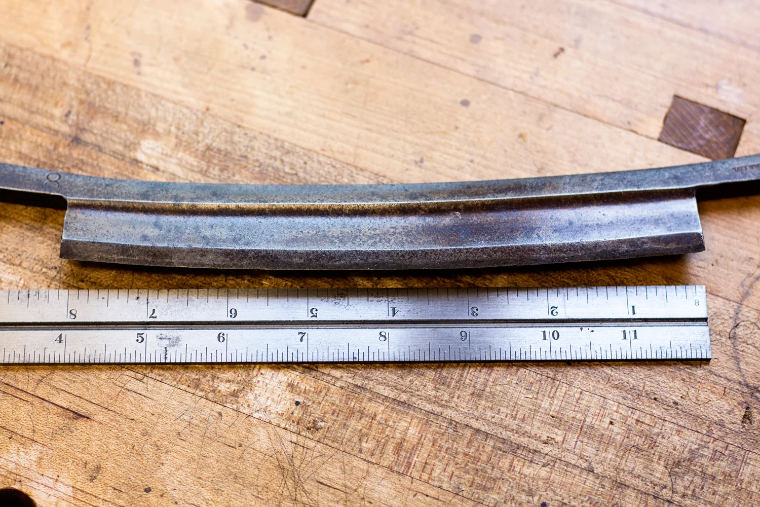 This drawknife blade measures 8".