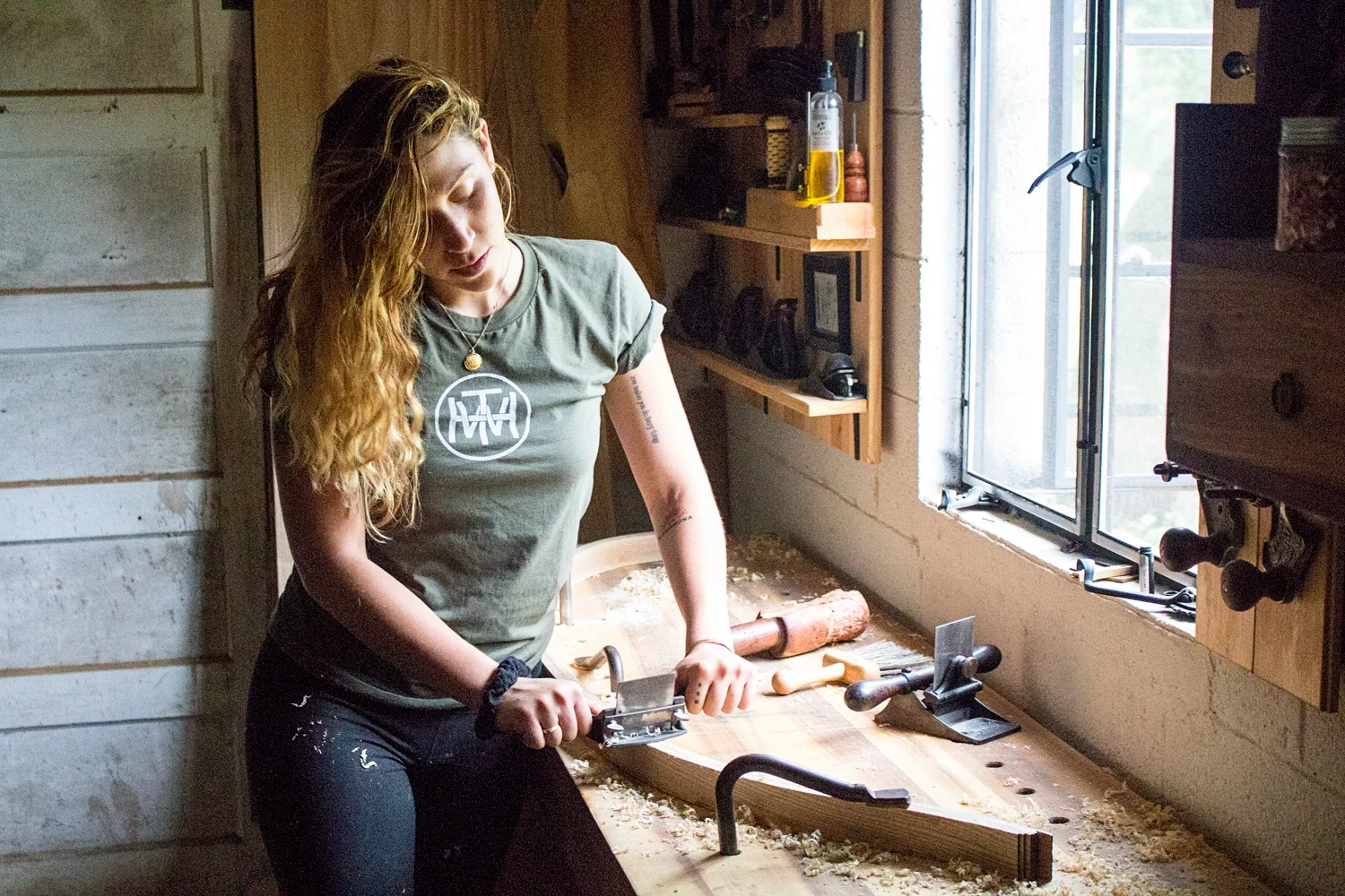 Just finished up a productive two days with Katerina working alongside me in the shop. She pretty much perfected the use of a cabinet scraper, using both the Stanley No. 80 and the No. 12 to successfully remove all of the excess glue from the bent laminations. Once you get through the rock hard plastic resin glue, the scraper planes take quite nice shavings.
