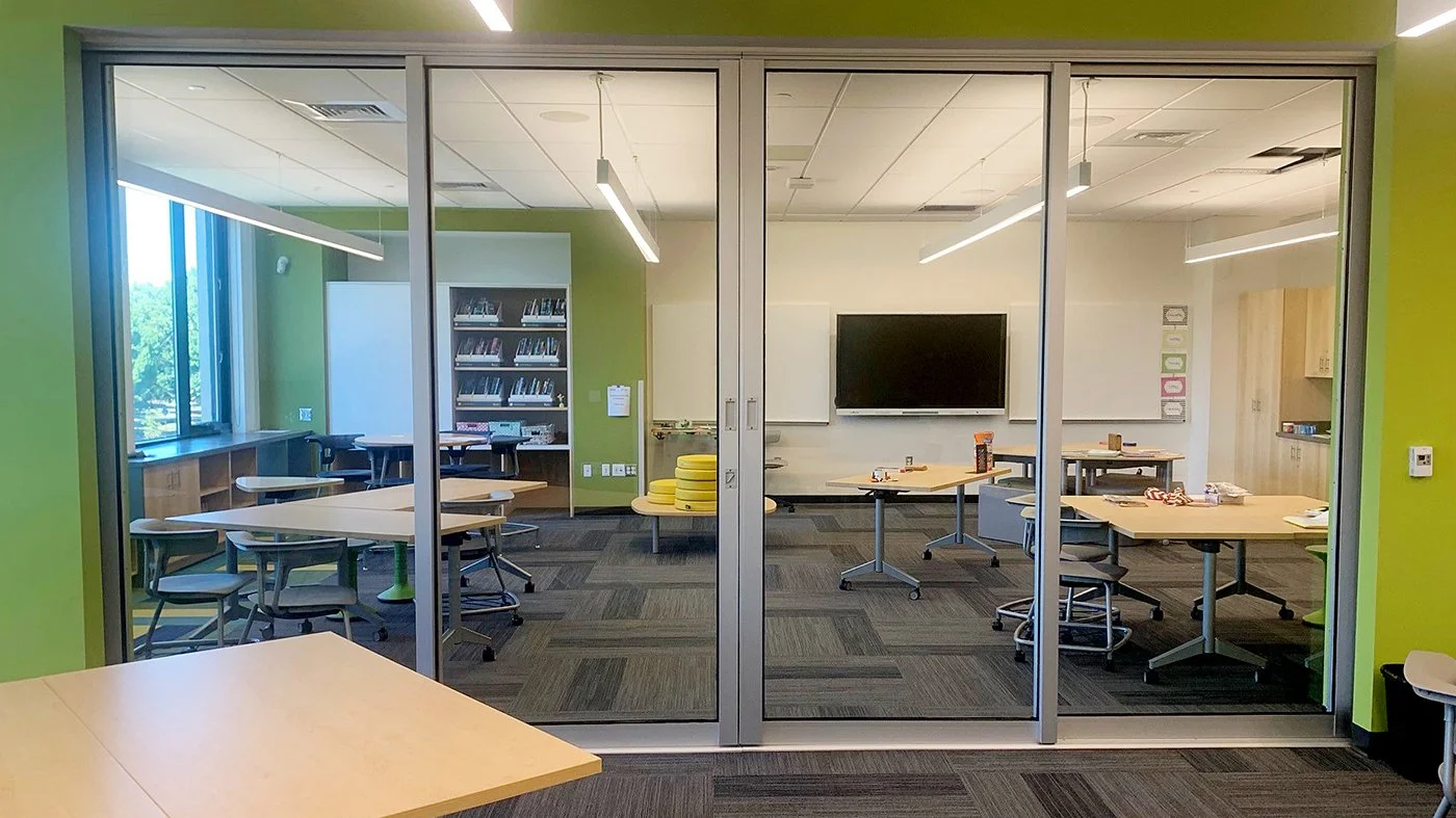 Solar Innovations Bi-Folding Door System opened between education spaces