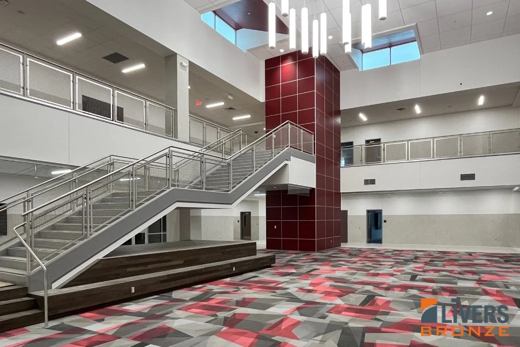 interior railings for Texas schools; K–12 railing systems; Livers Bronze Mirage railing; wire-mesh railing panels; school handrails Texas; education building products Texas; commercial railing systems for schools; higher-education railing design