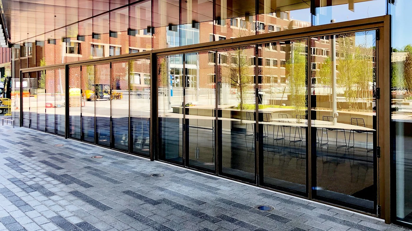 operable glass walls for schools; folding glass walls for classrooms; Slide & Stack Glass Walls; Bi-Folding Door Systems; flexible classroom design; K–12 building products