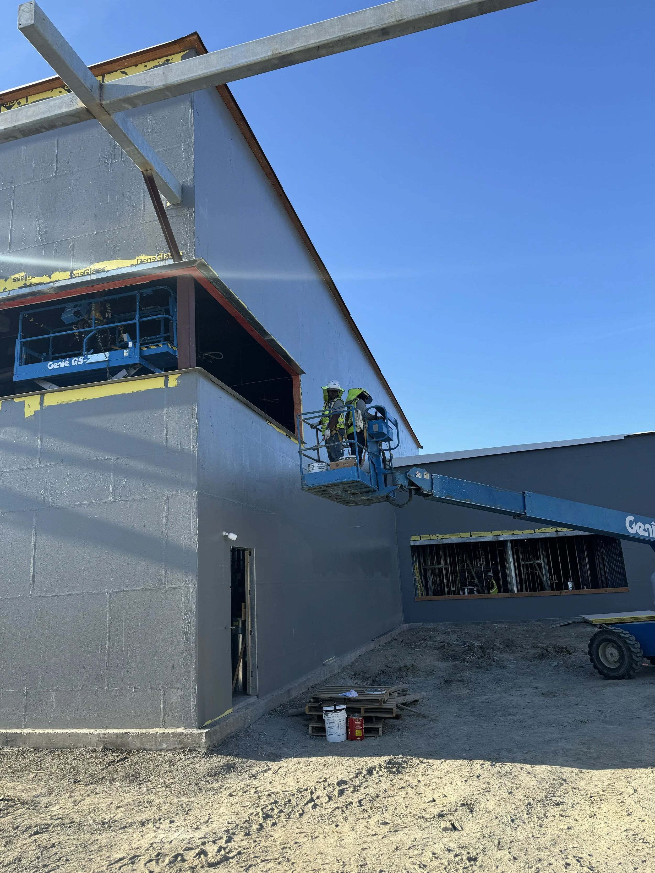 Liquid-applied GE Elemax air barrier detailed around a school window opening