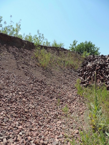 Acme/Ochs Brick Plant: Mountain of crushed brick for use as temper material.