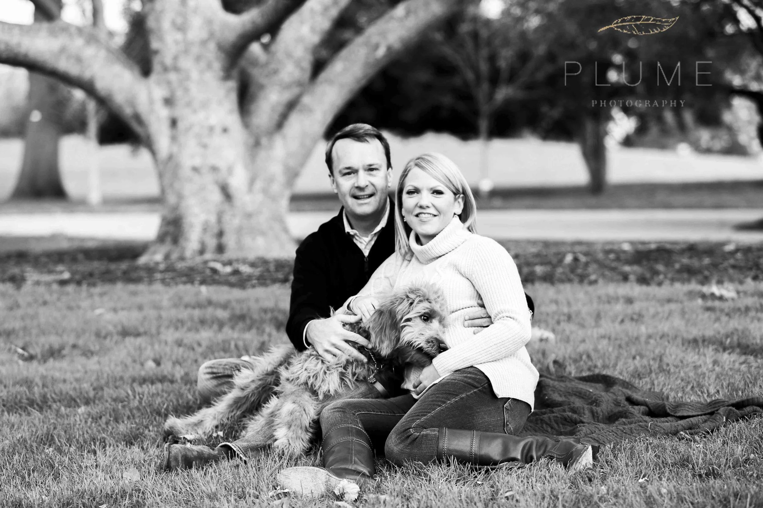 Holiday card / maternity shoot for Sarah and Raymond Paul with their goldendoodle Molly on the grounds of the US Capitol, Saturday, November 22, 2014. Photo by Amanda Reynolds