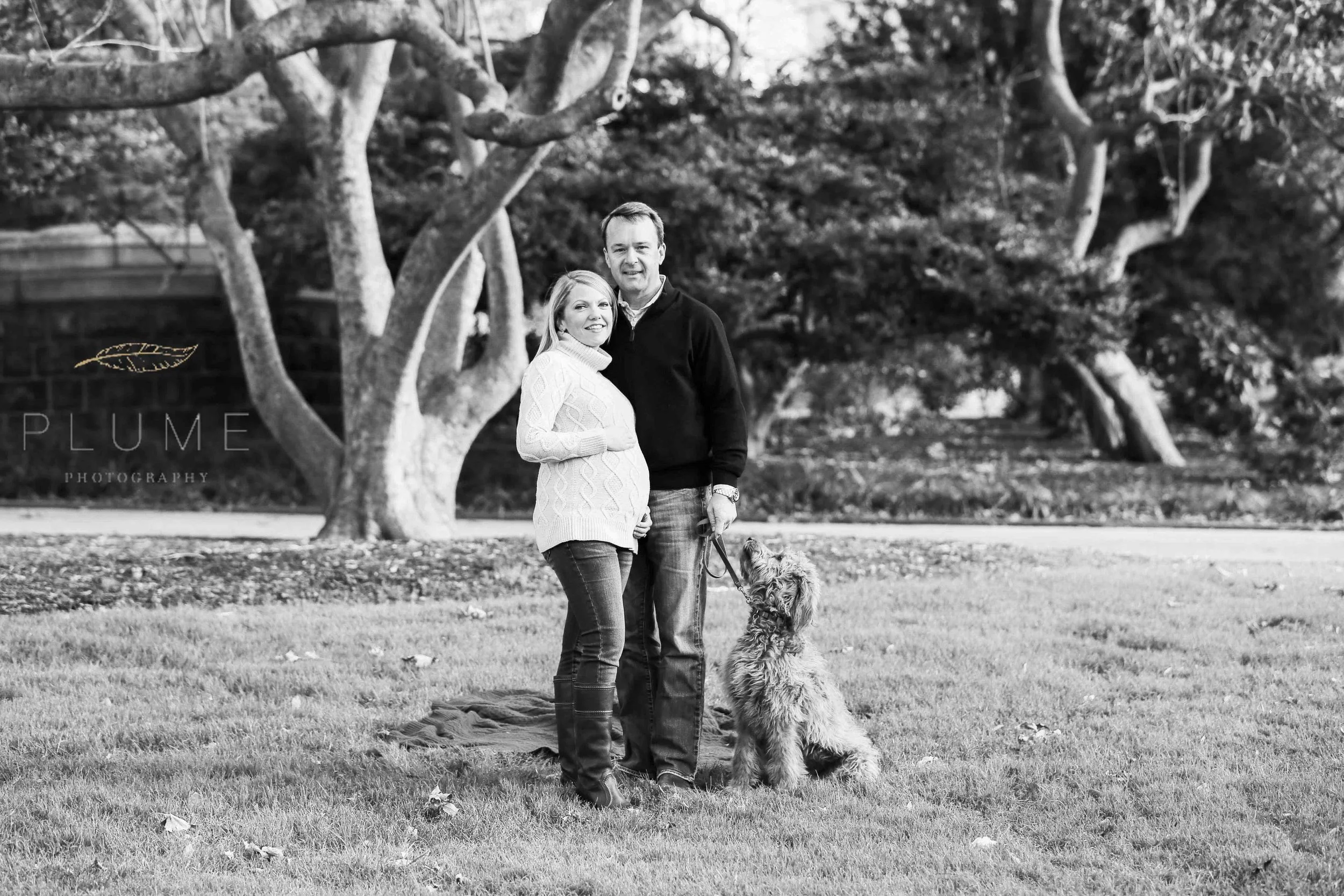 Holiday card / maternity shoot for Sarah and Raymond Paul with their goldendoodle Molly on the grounds of the US Capitol, Saturday, November 22, 2014. Photo by Amanda Reynolds