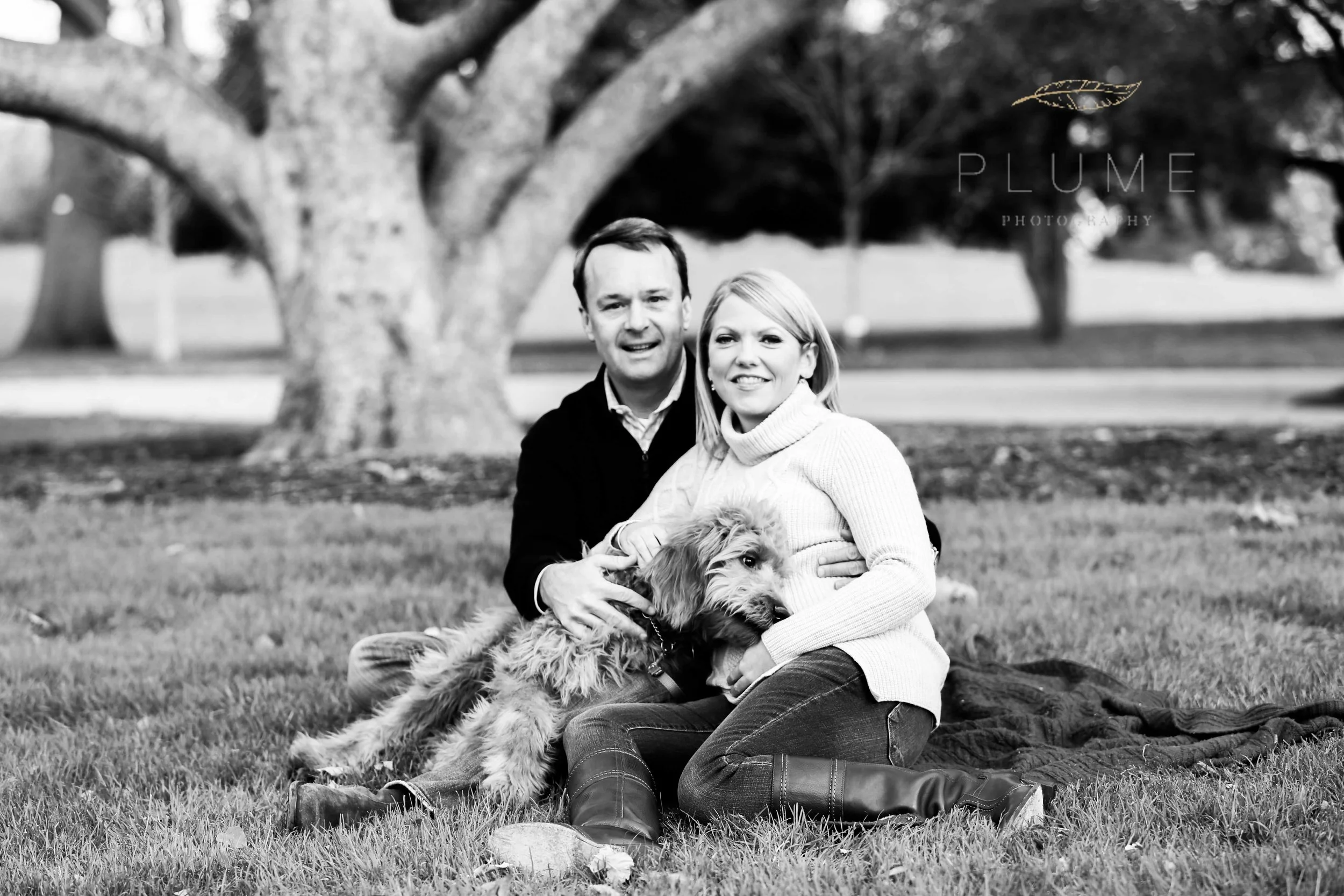 Holiday card / maternity shoot for Sarah and Raymond Paul with their goldendoodle Molly on the grounds of the US Capitol, Saturday, November 22, 2014. Photo by Amanda Reynolds