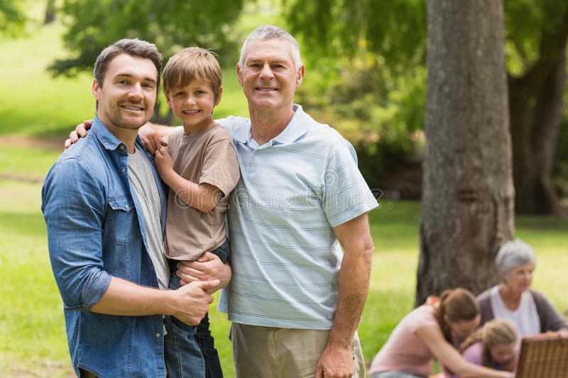 grandfather-father-son-family-background-park-portrait-37394311.jpg