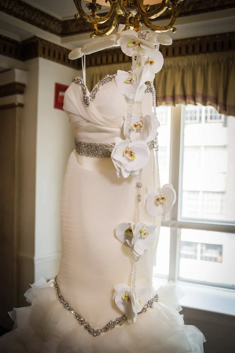 Silver-Beaded-White-Wedding-Dress-with-White-Orchids.jpg