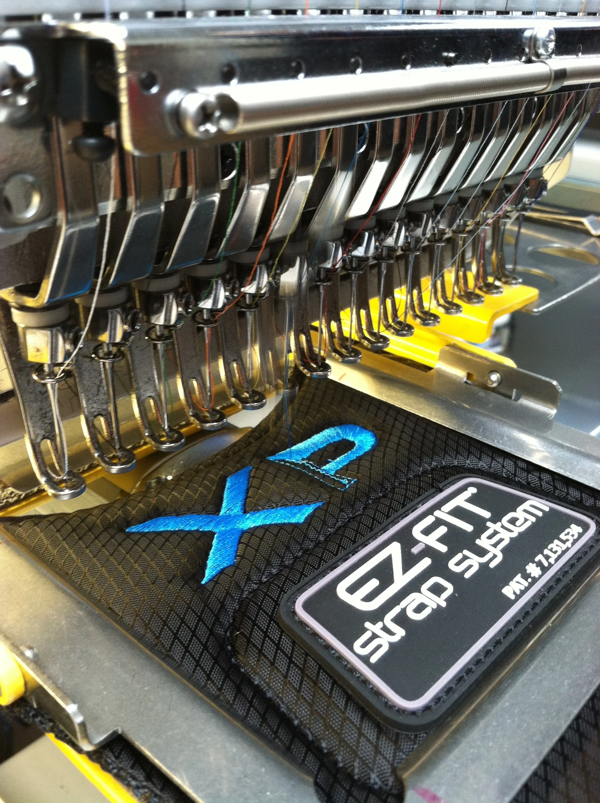 Embroidering the strap of a golf bag for a local golfer that we sponsor