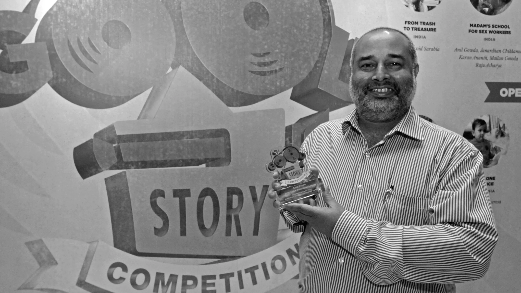 Pradip accepting his award in Singapore.