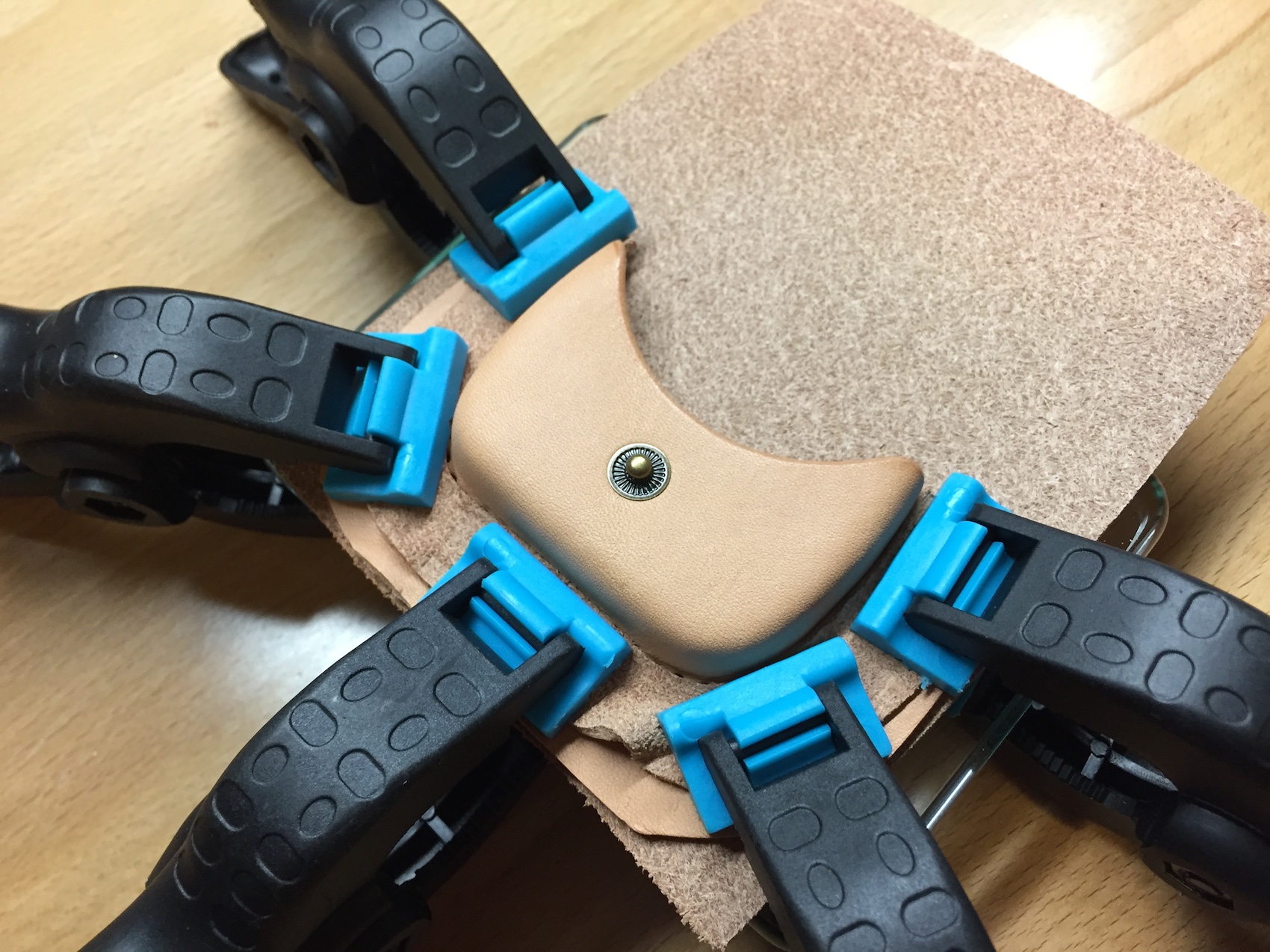 Glueing to the back.