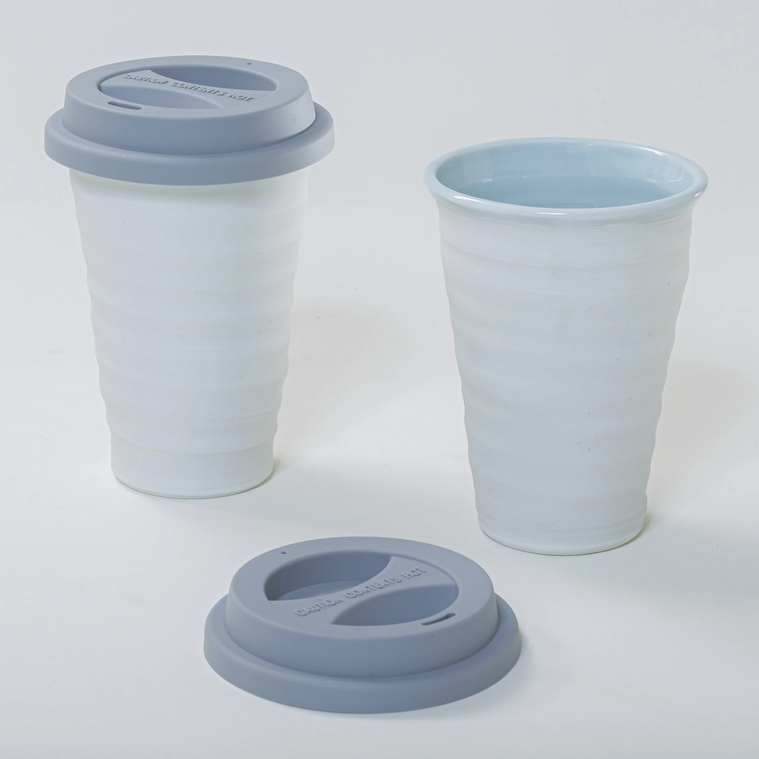  11 oz Travel Tumbler with silicone lid. Blue celadon on porcelain 