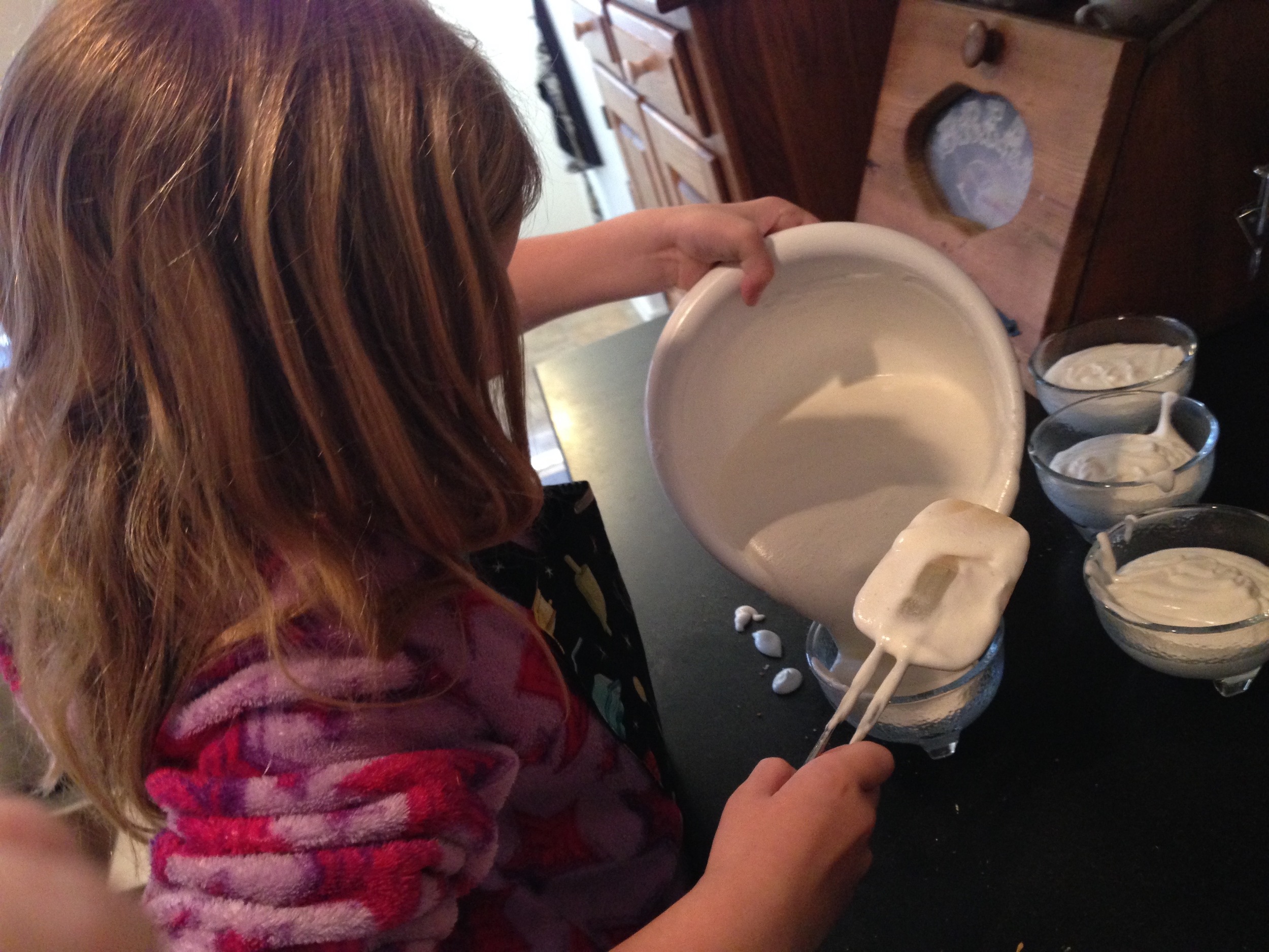 A delicate process of pouring the mousse. (I think I spilled some...)