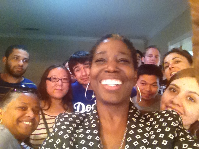 Roxanne Carter-Burnell (center) is surrounded by some of the members of the C2C (College to Career) family,
