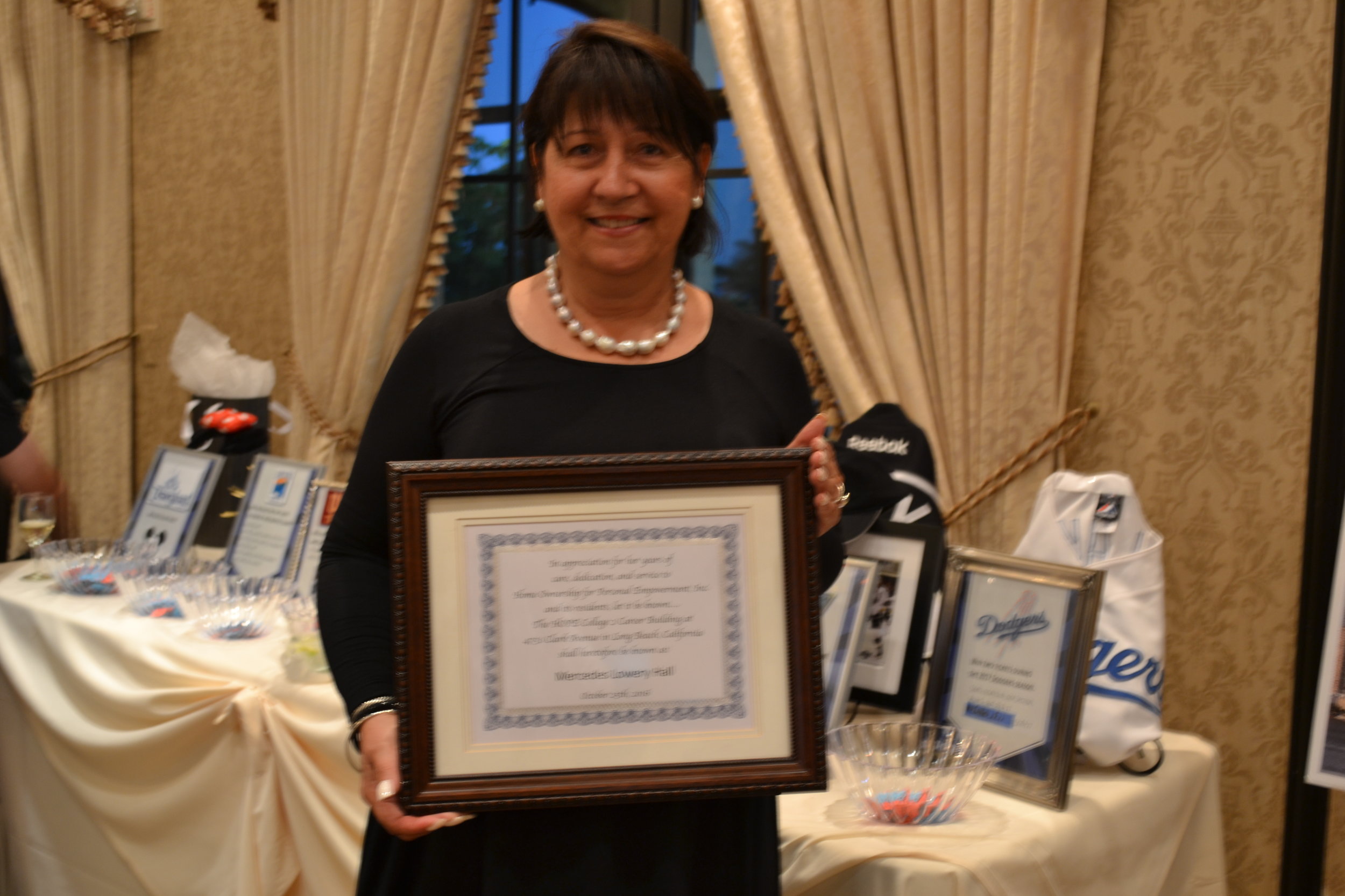Mercedes Lowery honored at event. 