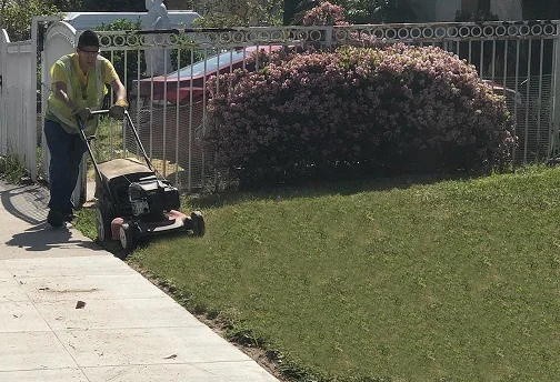 SVS Gardener mowing HOPE Lawn. (SVS)