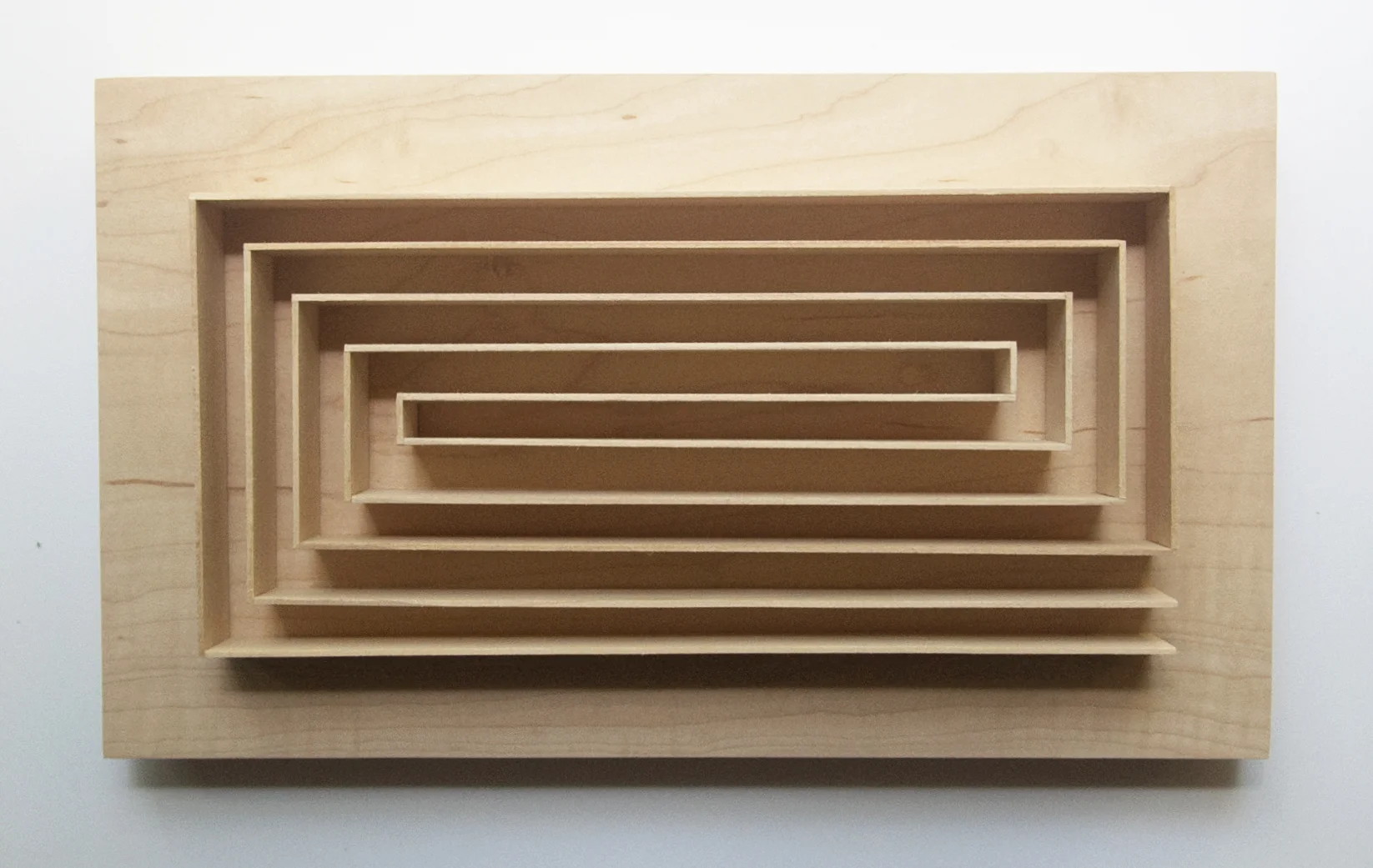 Meander, 2017, maple and basswood, 2x7x12"