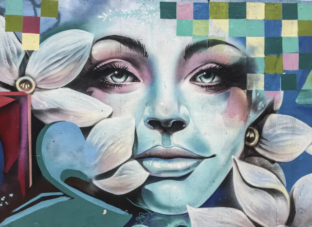A graffiti mural representing peace, at the entrance to the Comuna 13 / Independencia neighborhood. Now full of graffiti murals like this one, the neighborhood has made a comeback after drug and turf wars devastated the area.