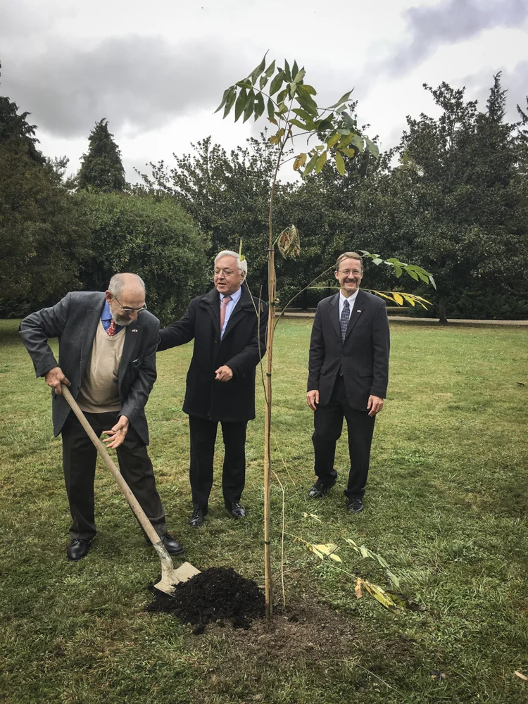 Bernard Dalisson, president of Les Pacaniers de Jefferson; Pyrénées-Atlantiques Préfet Gilbert Payet; and American Consul Daniel Hall.